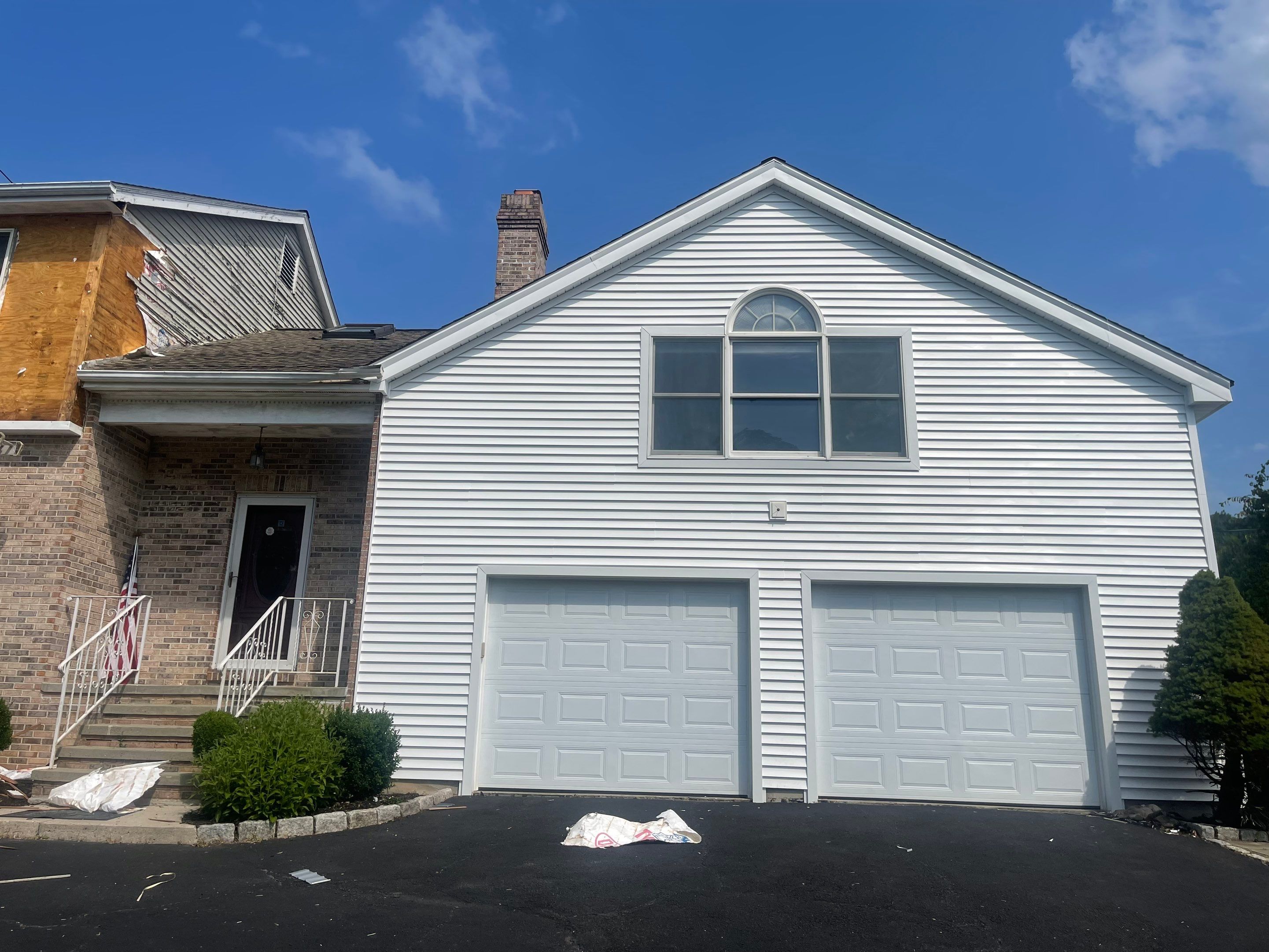 Siding Installation using Mainstreet Colonial & White gutters by A Plus Exterior