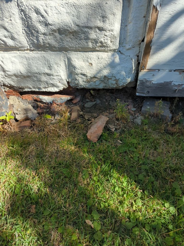 Wall repair with Fortress Invisibeams by ACE Waterproofing & Basement Solutions