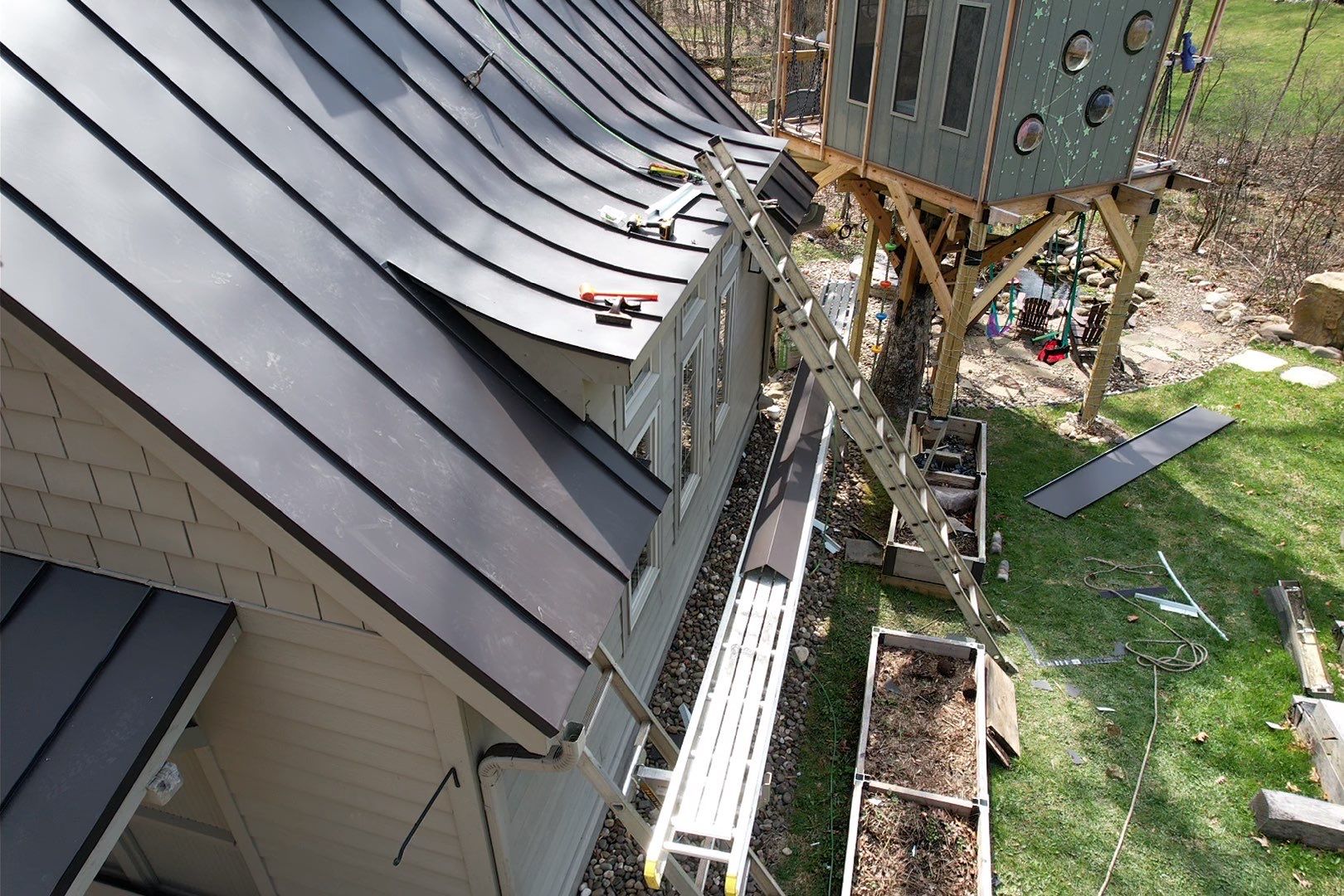 Metal Roof Replacement  by American Home Contractors