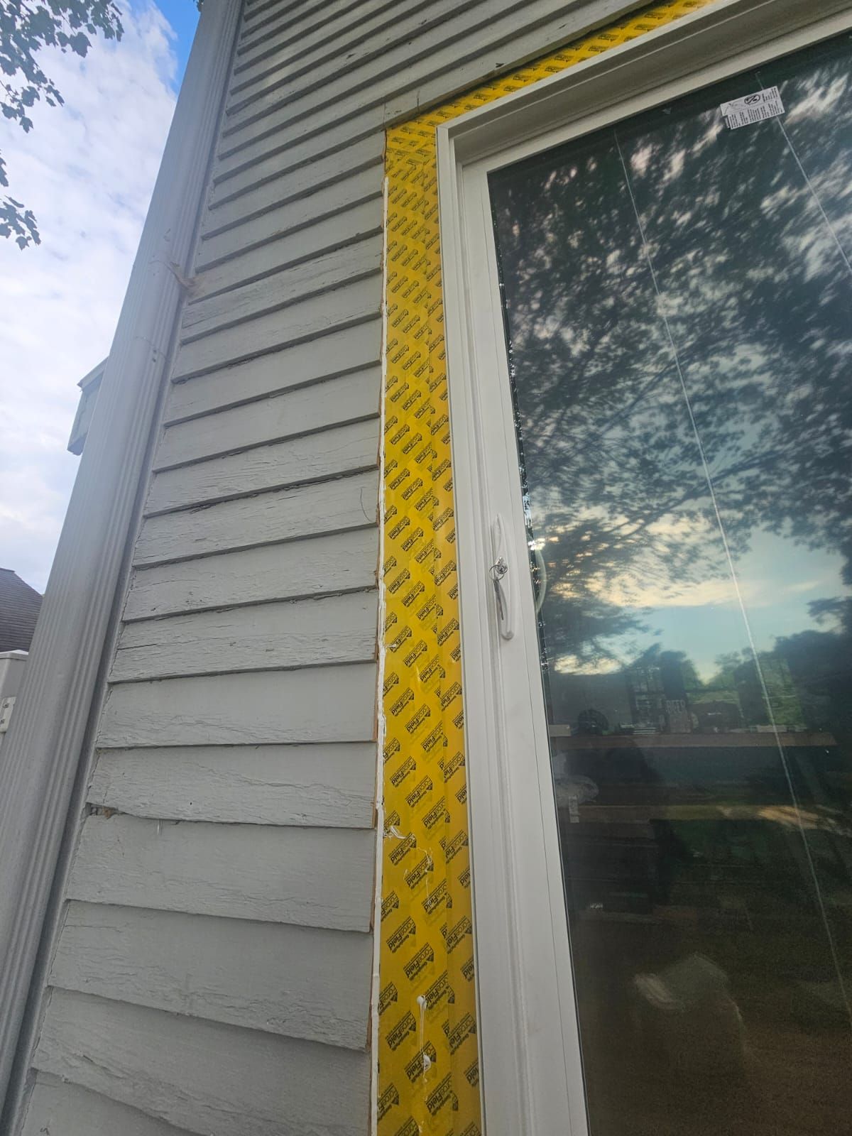 Patio Slider Door and Rear Deck  by Avalon Roofing and Exteriors