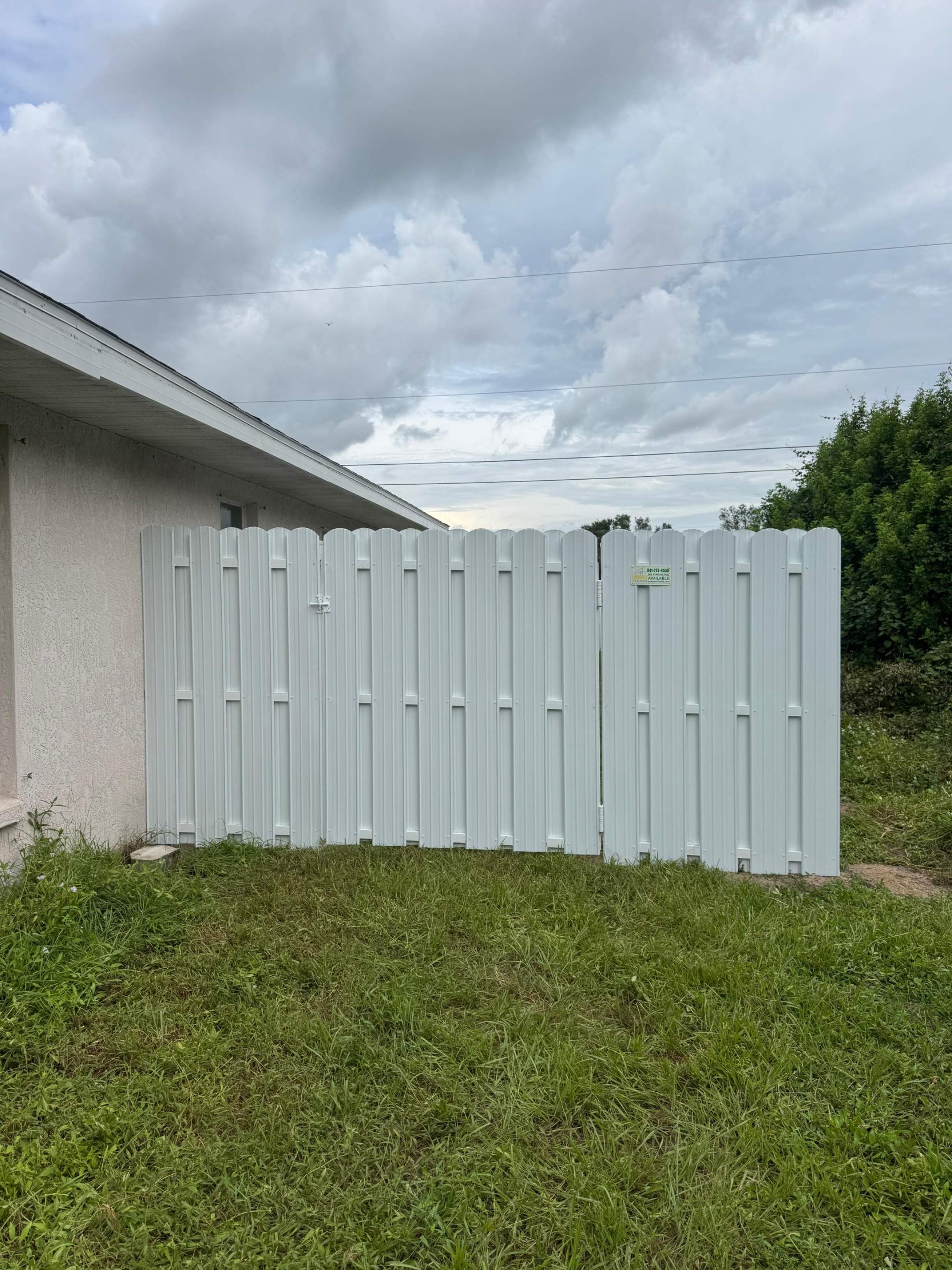 White Vinyl Privacy Fence Installation in North Port by True Fence LLC