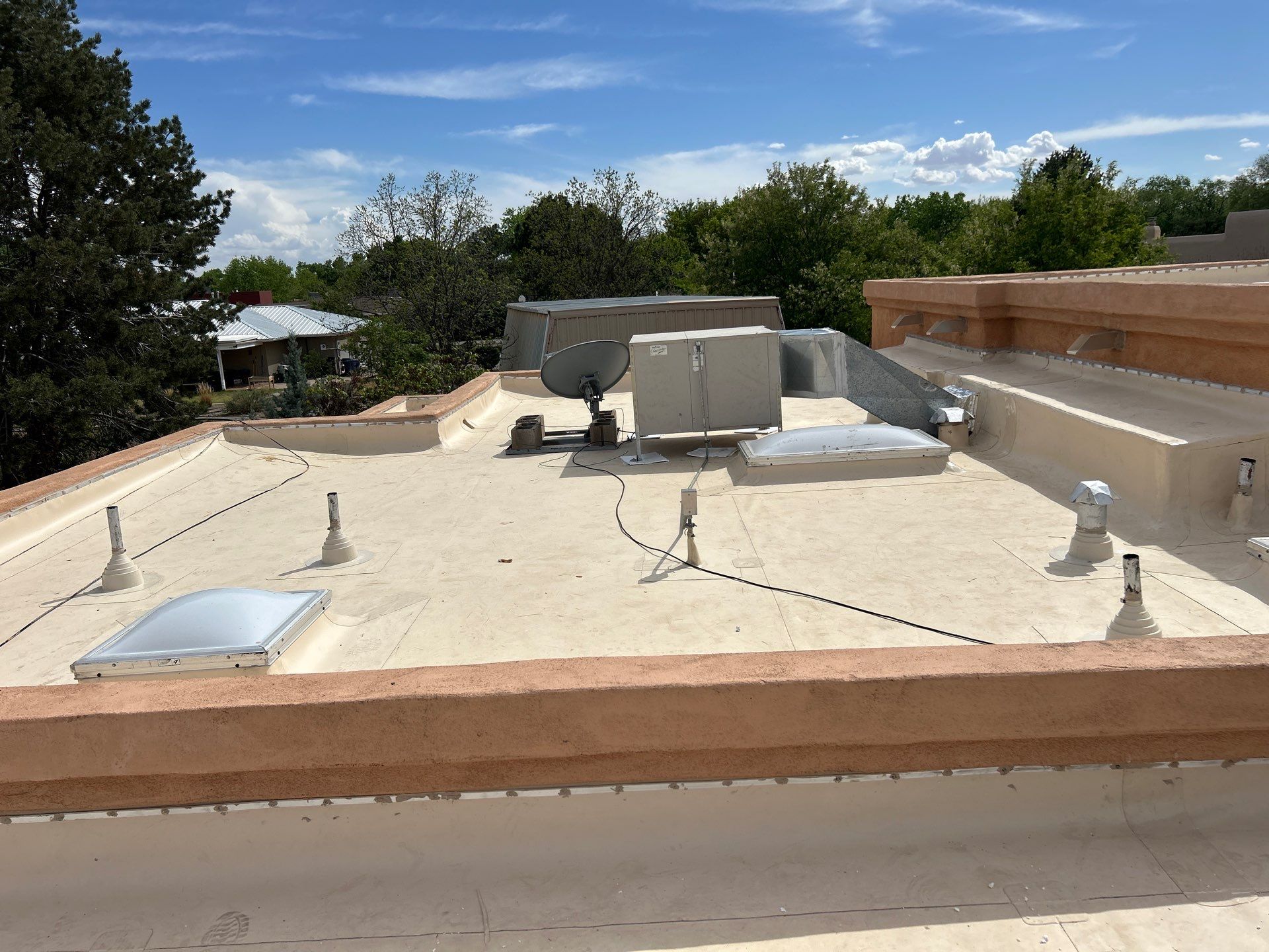 Residential TPO Flat Roof Replacement and Skylight Installation in Albuquerque by Doyle Roof Masters Inc