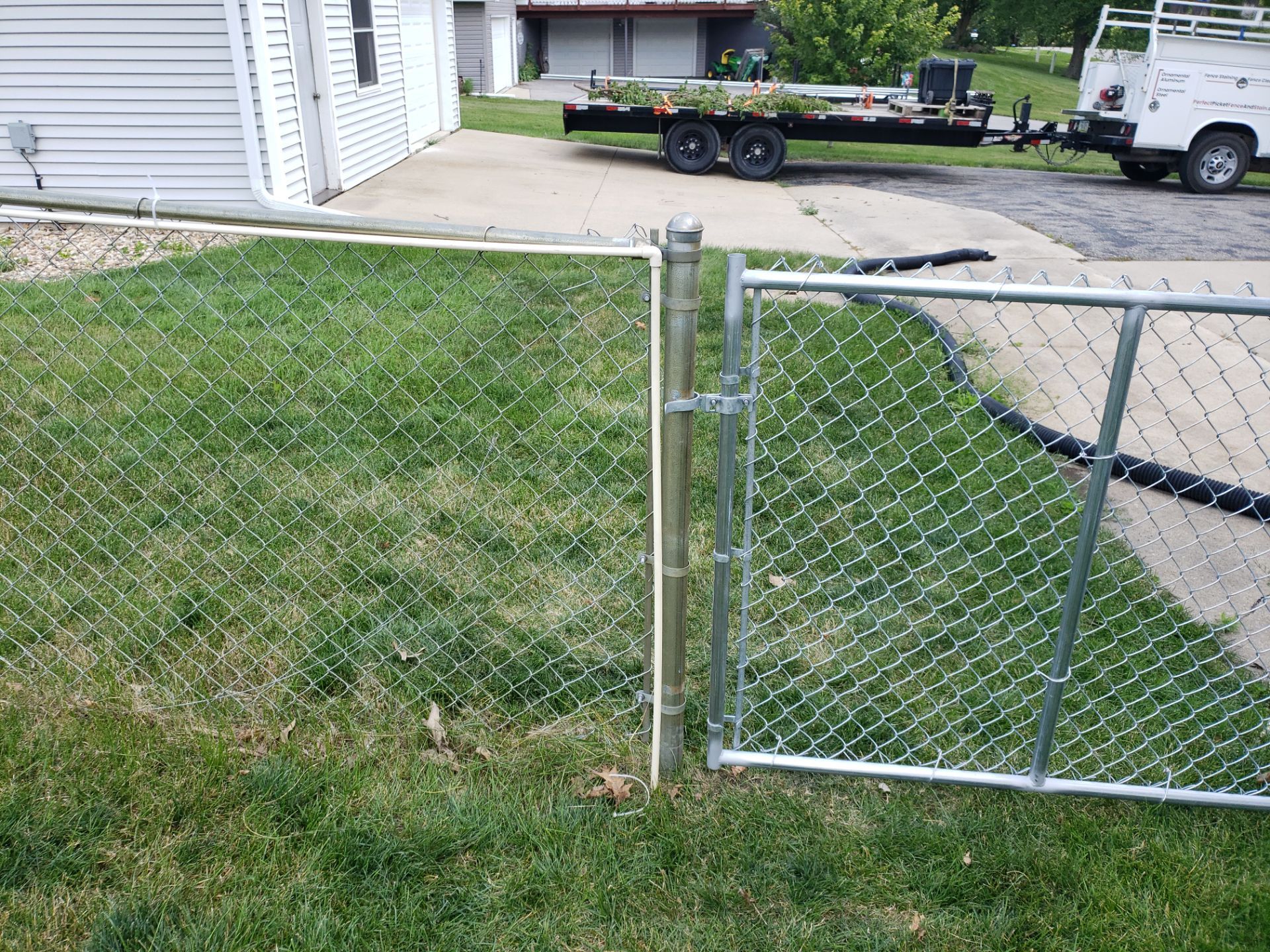 Hudson Residential Chain Link Fence and Pedestrian Gate Installation by Perfect Picket Fence and Stain