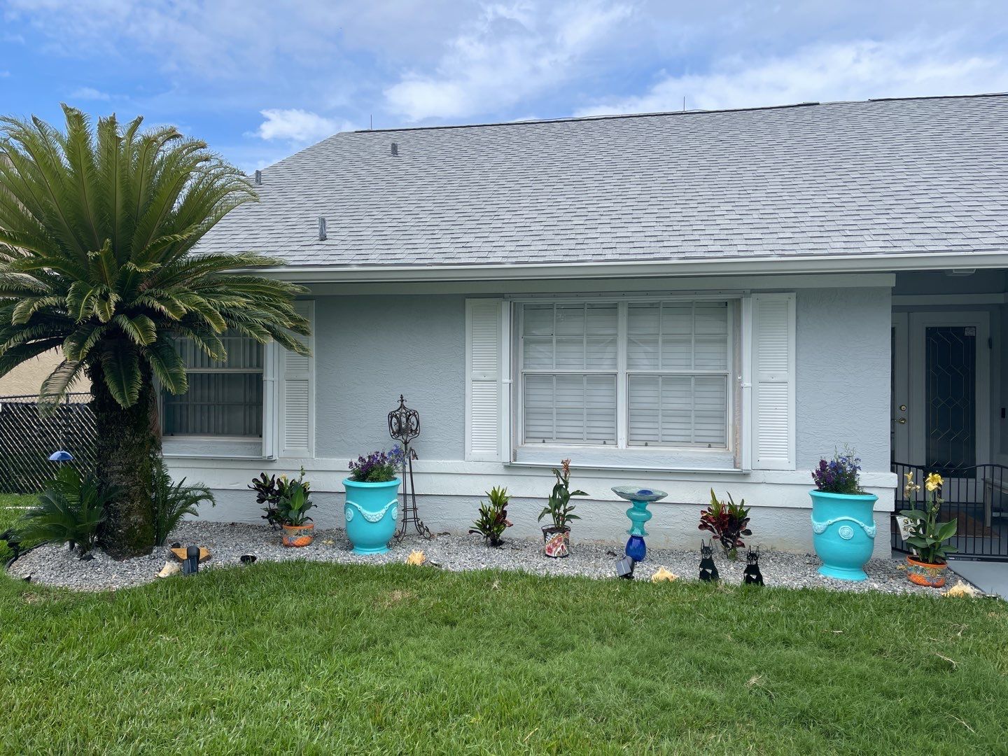 Accordion shutter and Bahama with front slide rod by Smart Guard Shutters