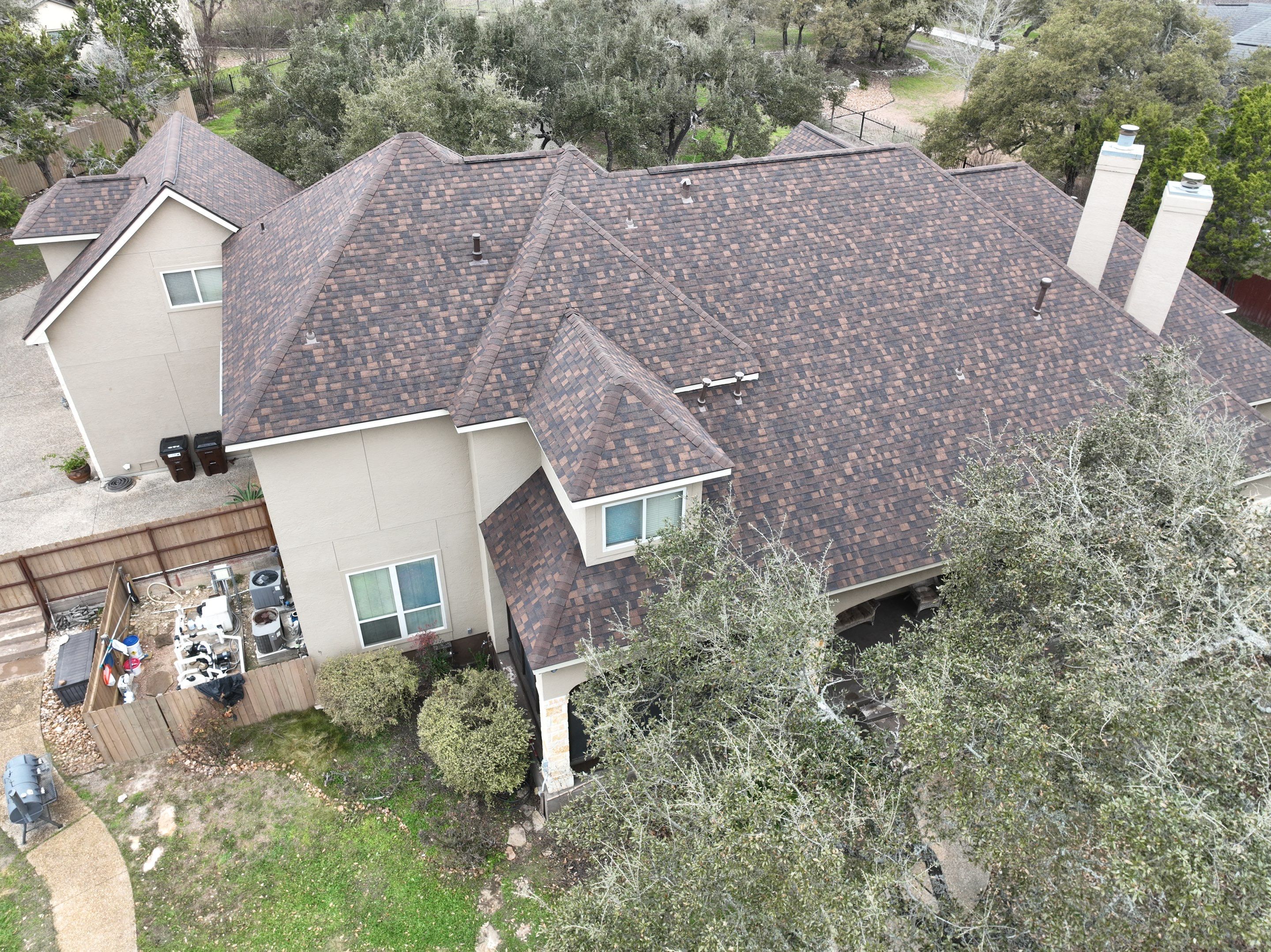 Residential Roof Replacement using 30 Year Laminate Shingles with High Profile Ridge by Premier Roofing and Contracting