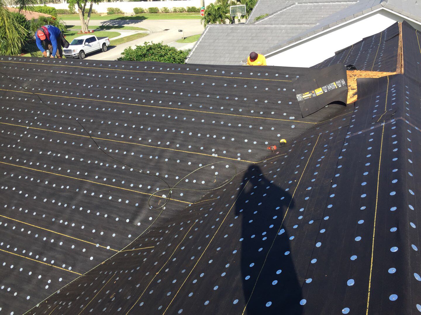Residential Roofing Installation using 1" Nail strip metal roof by BLUES BROTHERS ROOFING