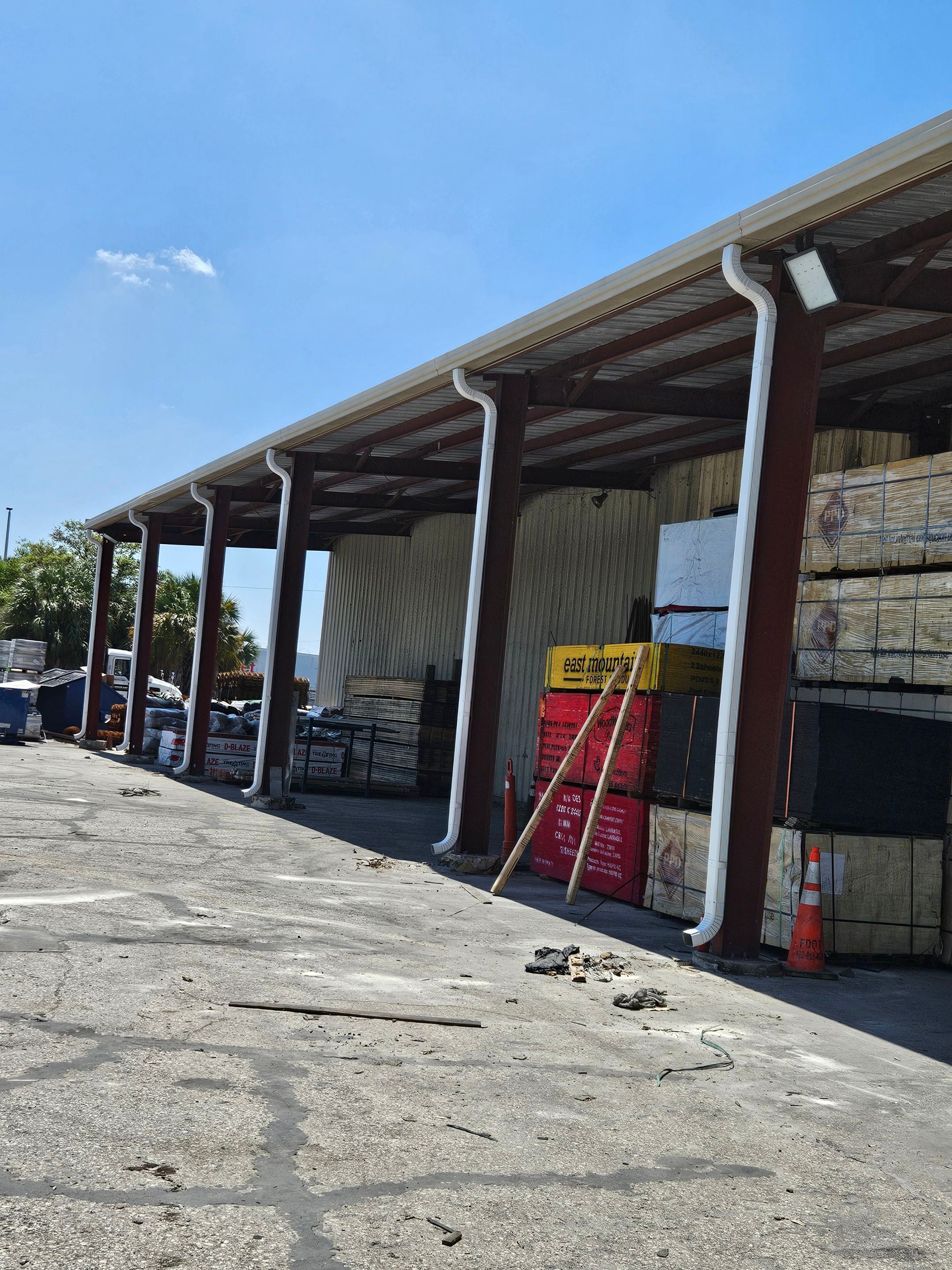 Commercial Box Gutters and White Downspouts Installation in Tampa FL by Gutter Professors