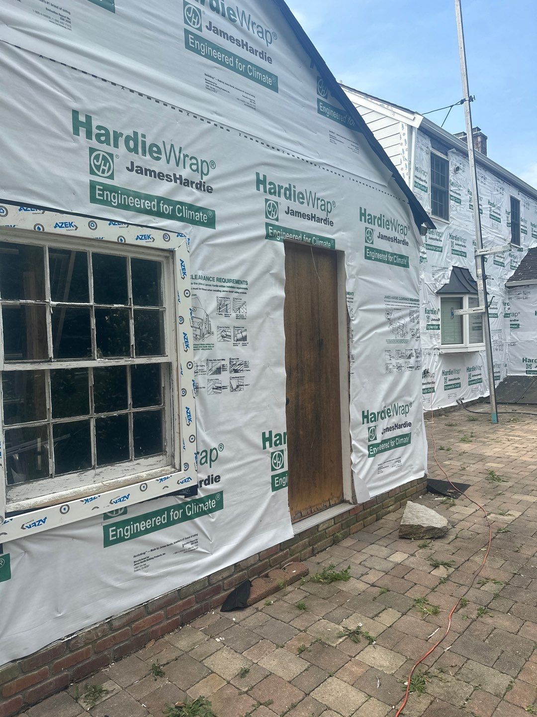 Siding Installation using Hardie Plank Artic white by A Plus Exterior