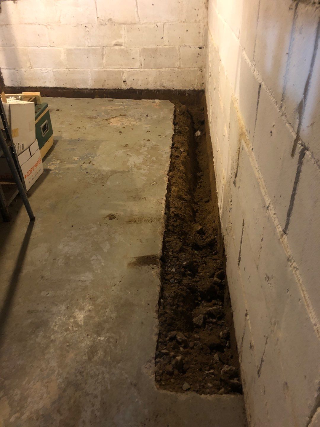 Basement Waterproofing using Drain tile system and a foundation wrap by ACE Waterproofing & Basement Solutions