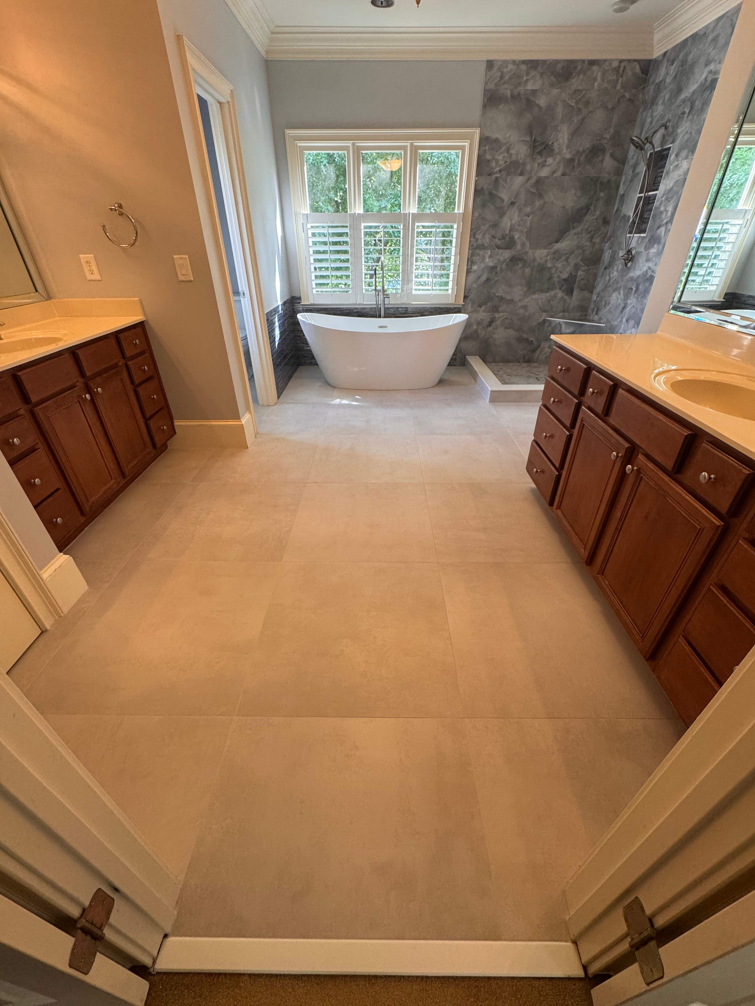Master bathroom renovation using Free standing tub by Prudencio
