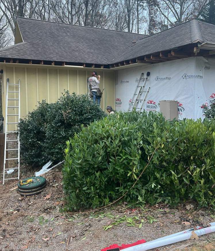 Siding, Gutter, and Replacement with Exterior Painting on 1974 Built Home in Roswell, GA by Nelson Exteriors 