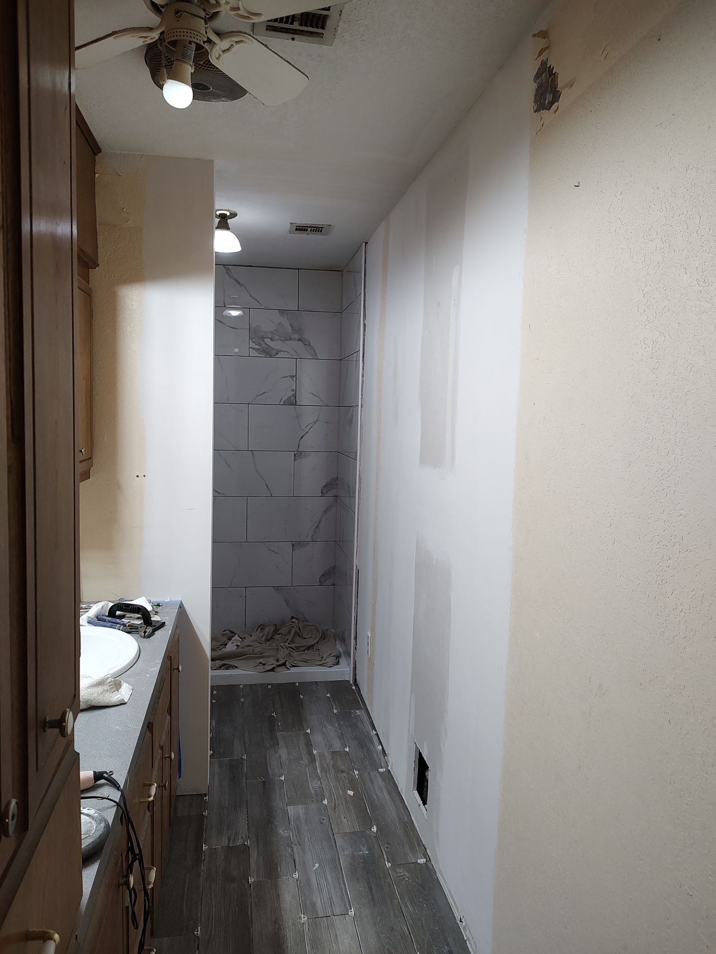 Bathroom remodel w/shower upgrade by In & Out Construction & Remodeling, LLC