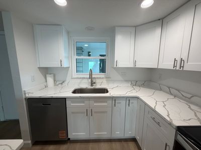 Full Condominium Remodel Featuring Aubrey Oak Flooring In Daytona Beach