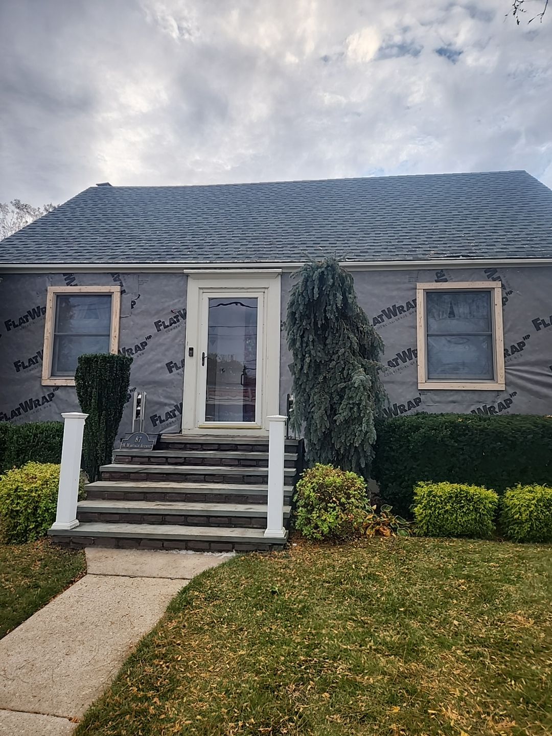 "Levittown Beauty Unveiled: A Siding Transformation Story" by Nisi Home Improvement