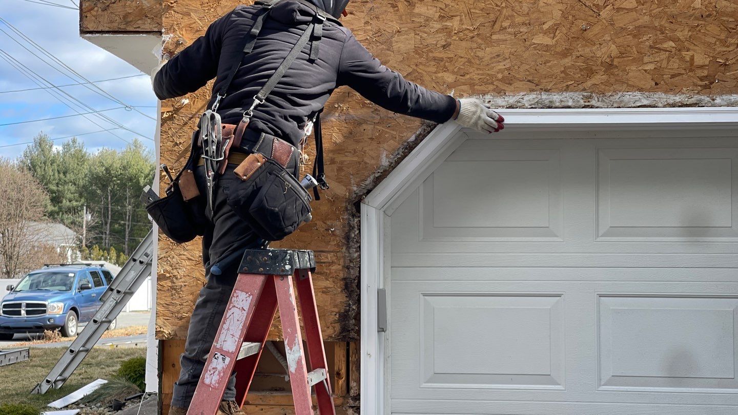 Complete Exterior Renovation with New Siding & Gutters   by Sensible Home Solutions