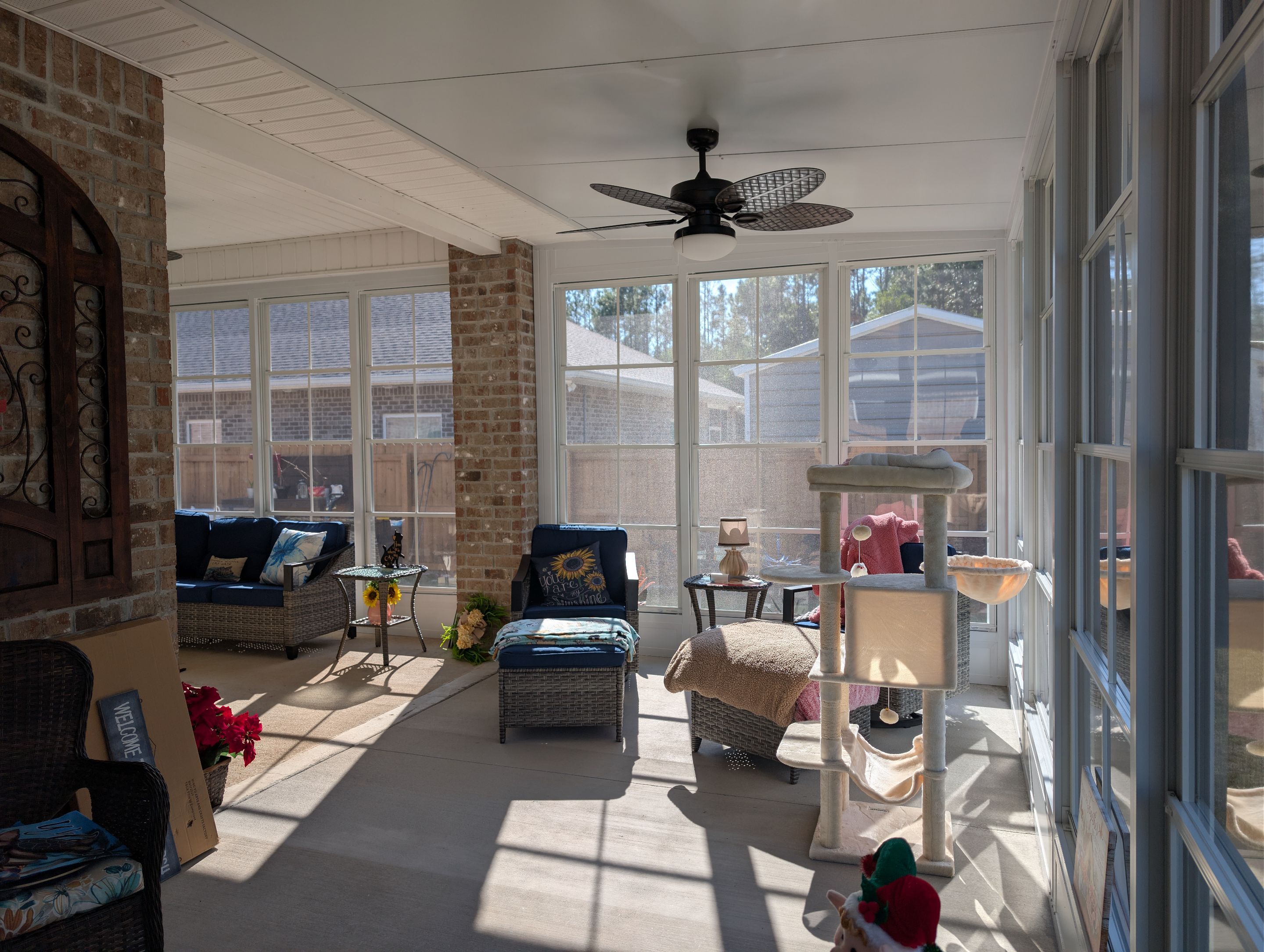 Home addition w/Vinyl 4-Track Windows by Titan Sunrooms