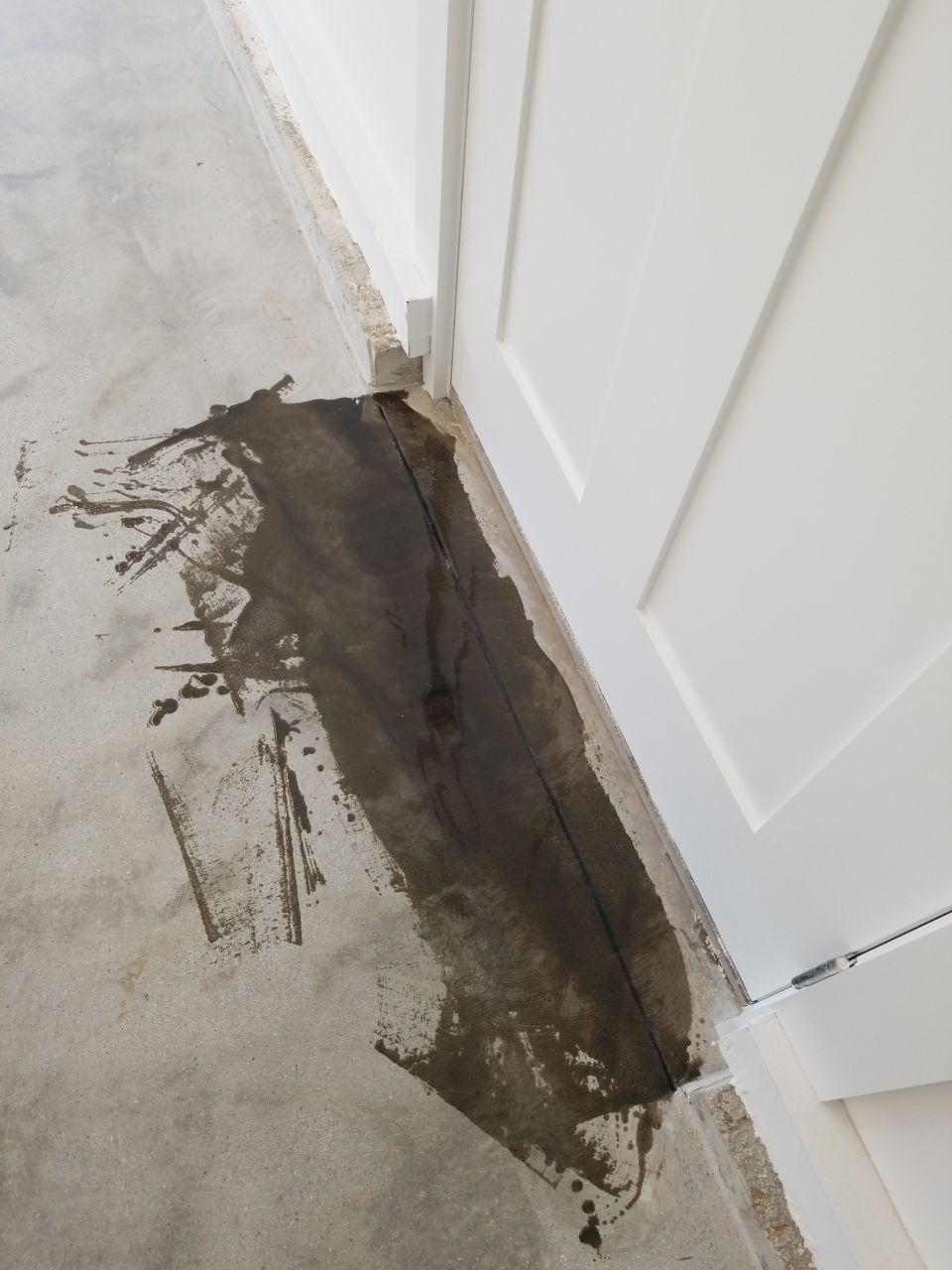 Garage Floor in Sandstone by Spectrum Painting, LLC