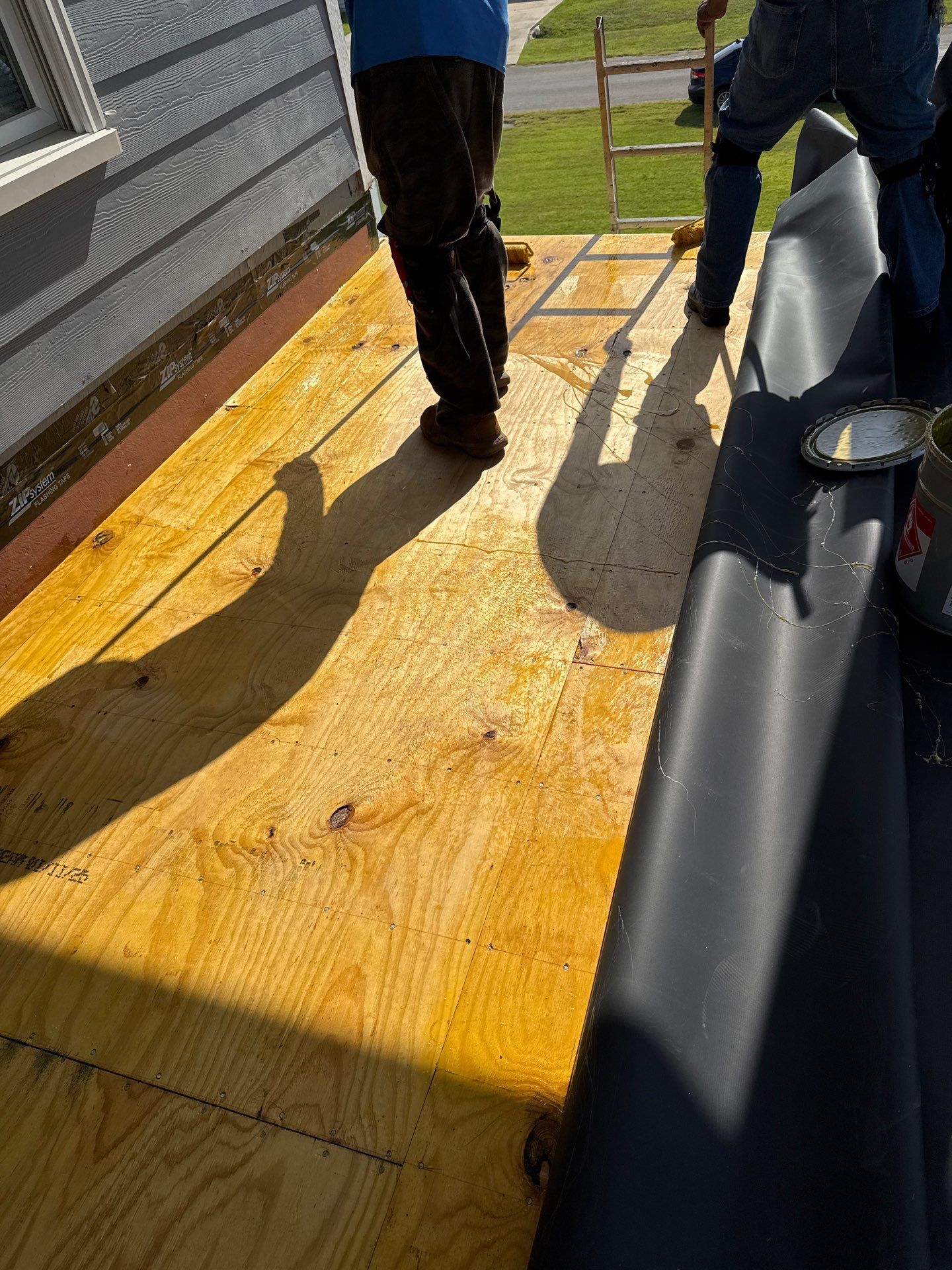 Walk Out Patio Cover by Bayfront Roofing and Construction