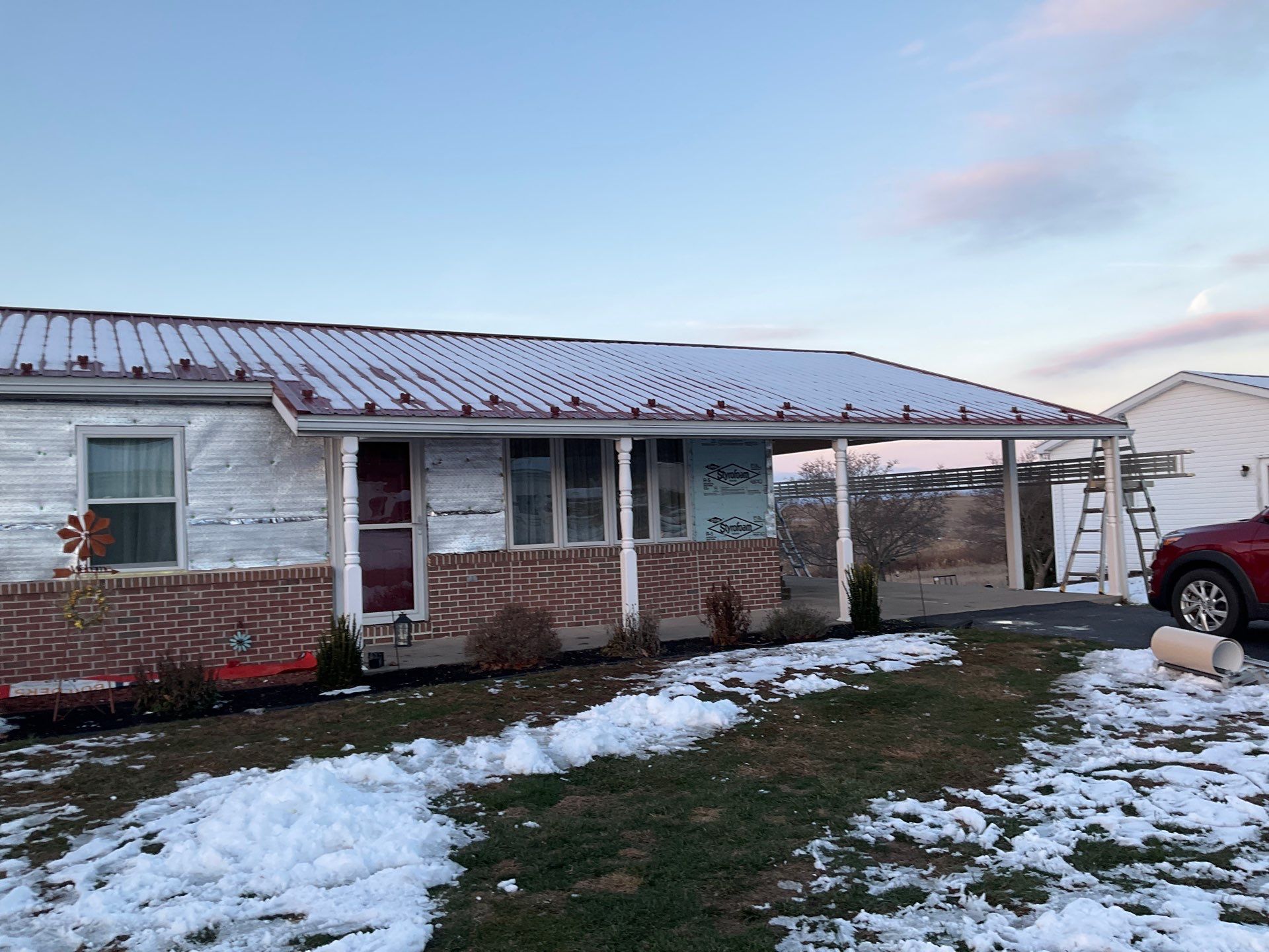 Vinyl Siding Replacement and Patio Door Installation in Elizabethville by Esh Builders