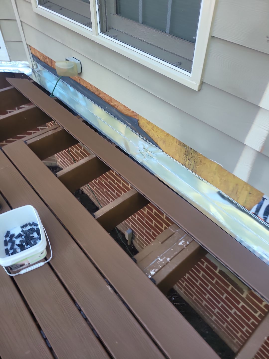 Fuquay-Varina Outdoor Upgrade – Composite Deck & Paved Landing by Elite Remodeling and Design LLC