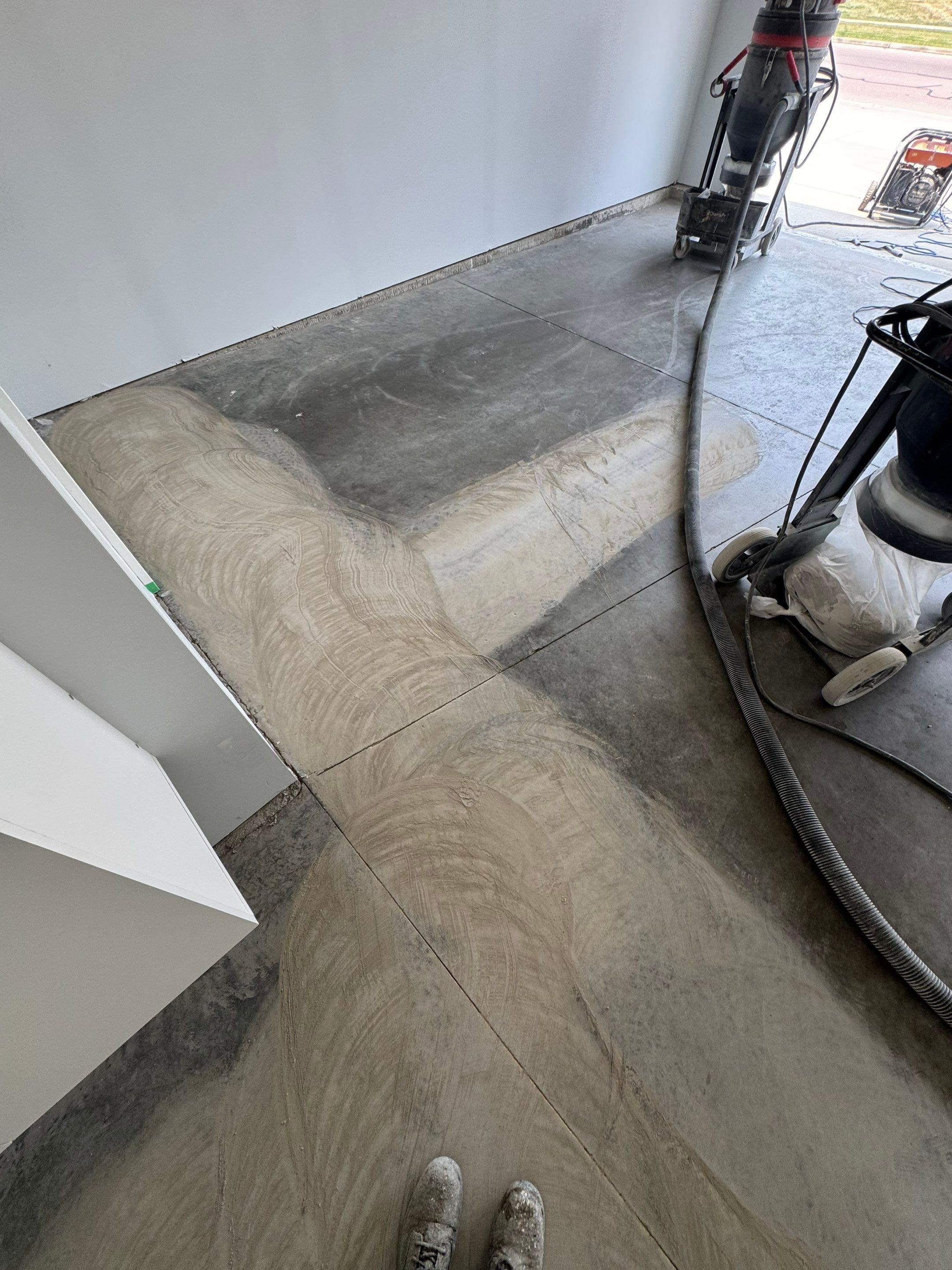 Custom Coyote Flake Garage Floor Coating in Sioux Falls by Select Painting, Coatings & Garage Cabinets