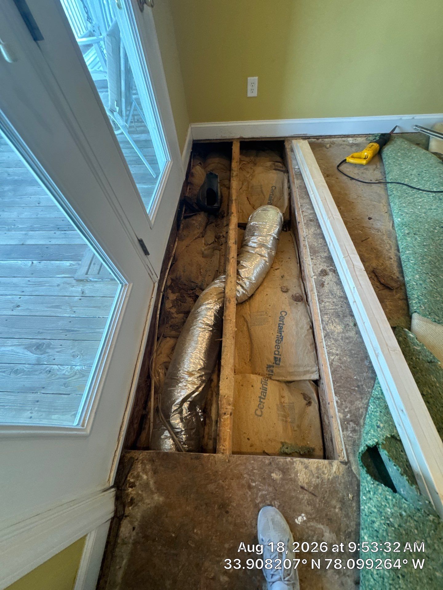 Subfloor Repair Beside Patio Doors in Oak Island, NC by RGR Construction and Roofing, LLC