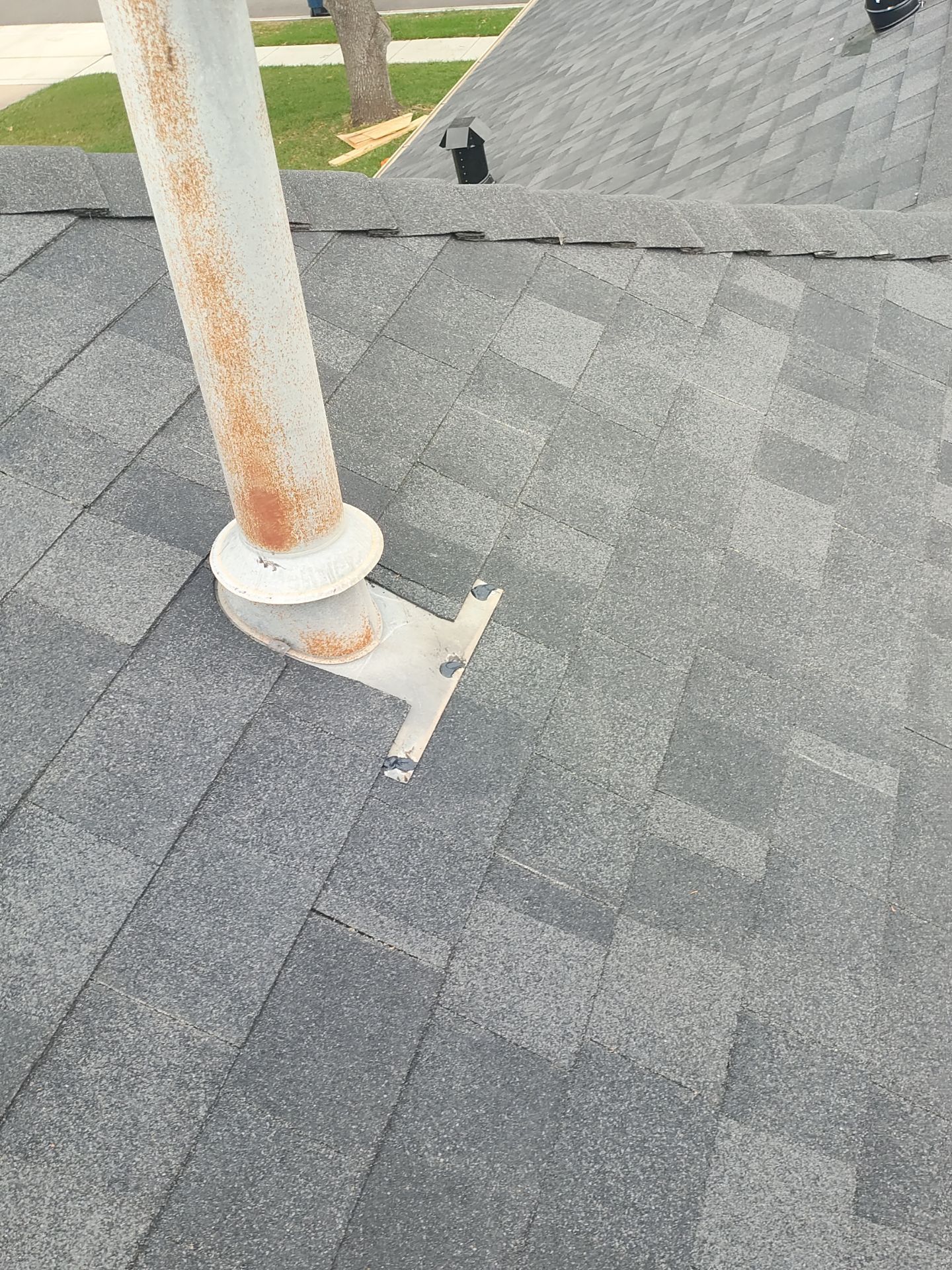 Nothing looks nicer than a little black roof by Bayfront Roofing and Construction