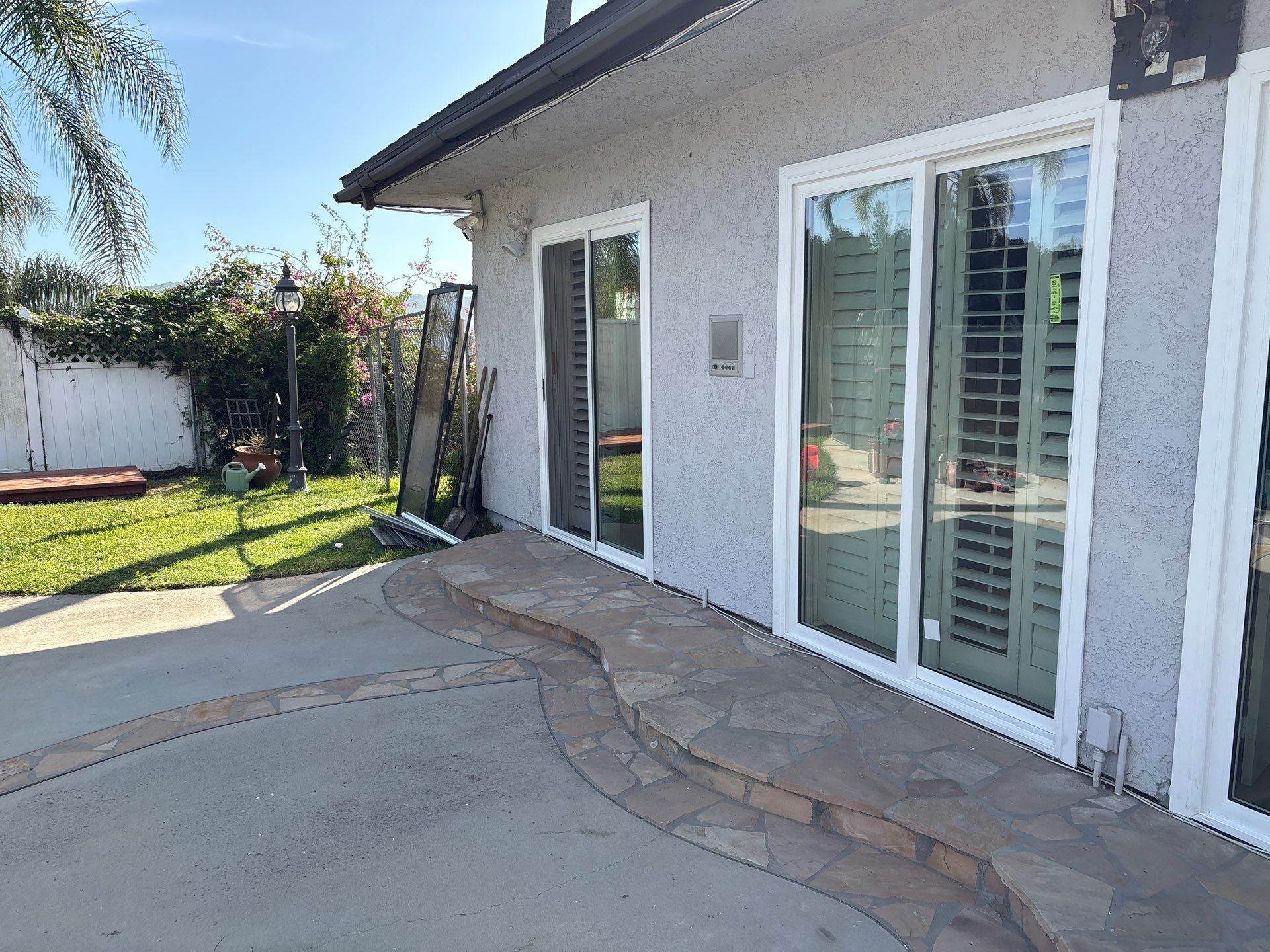 New Dark Frame Milgard Window and Sliding Door Installation in Covina by American Window Company