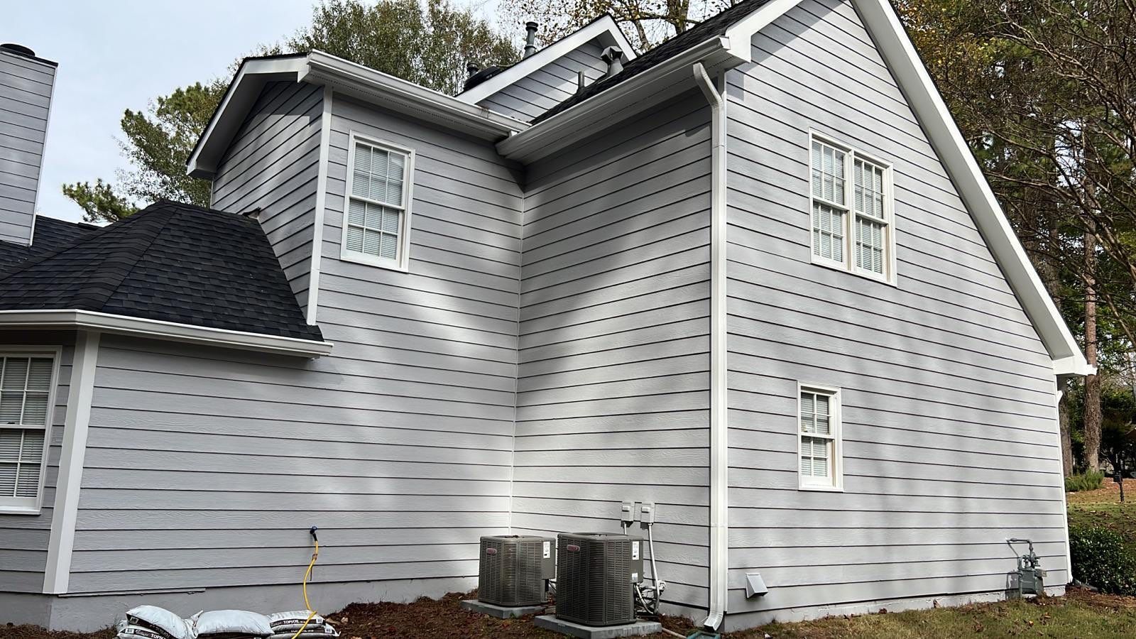 Full Exterior Home and Detached Garage Painting in Kennesaw by Swift Home Renovations 