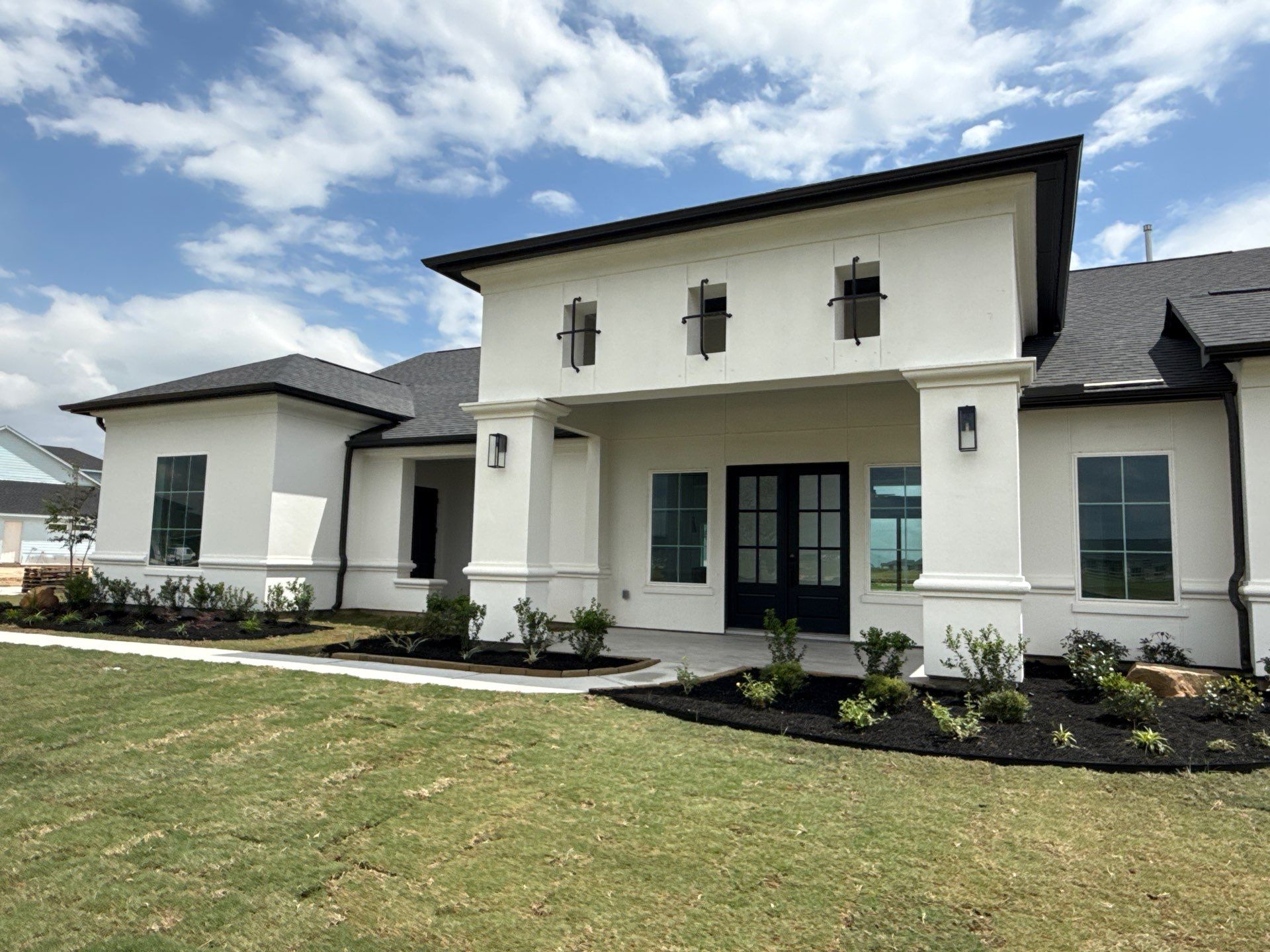 Custom Stucco Masterpiece with Precision Foam Detailing – Waller, TX by Apex Conventional Stucco Llc