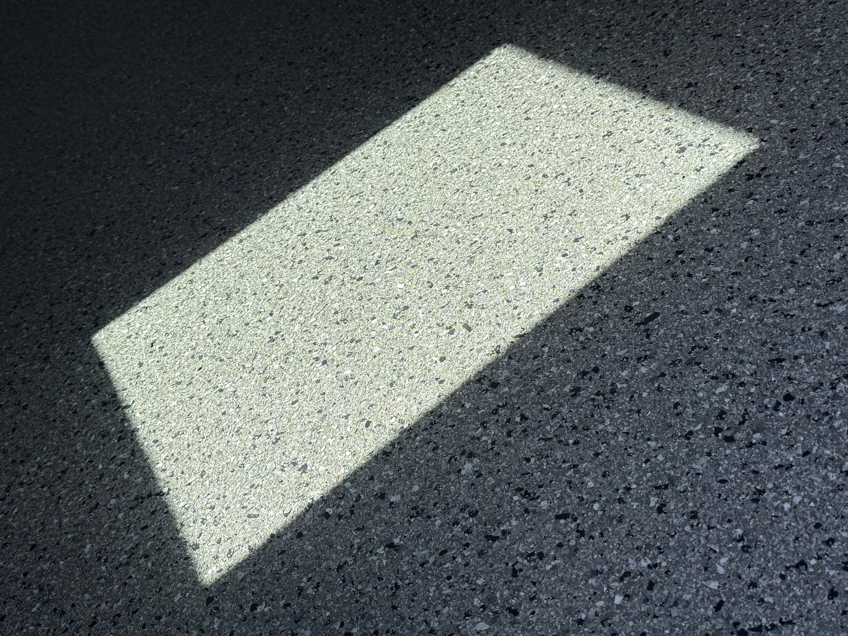 Residential Garage Floor Coating with Grey Speckled Epoxy Finish by Select Painting, Coatings & Garage Cabinets
