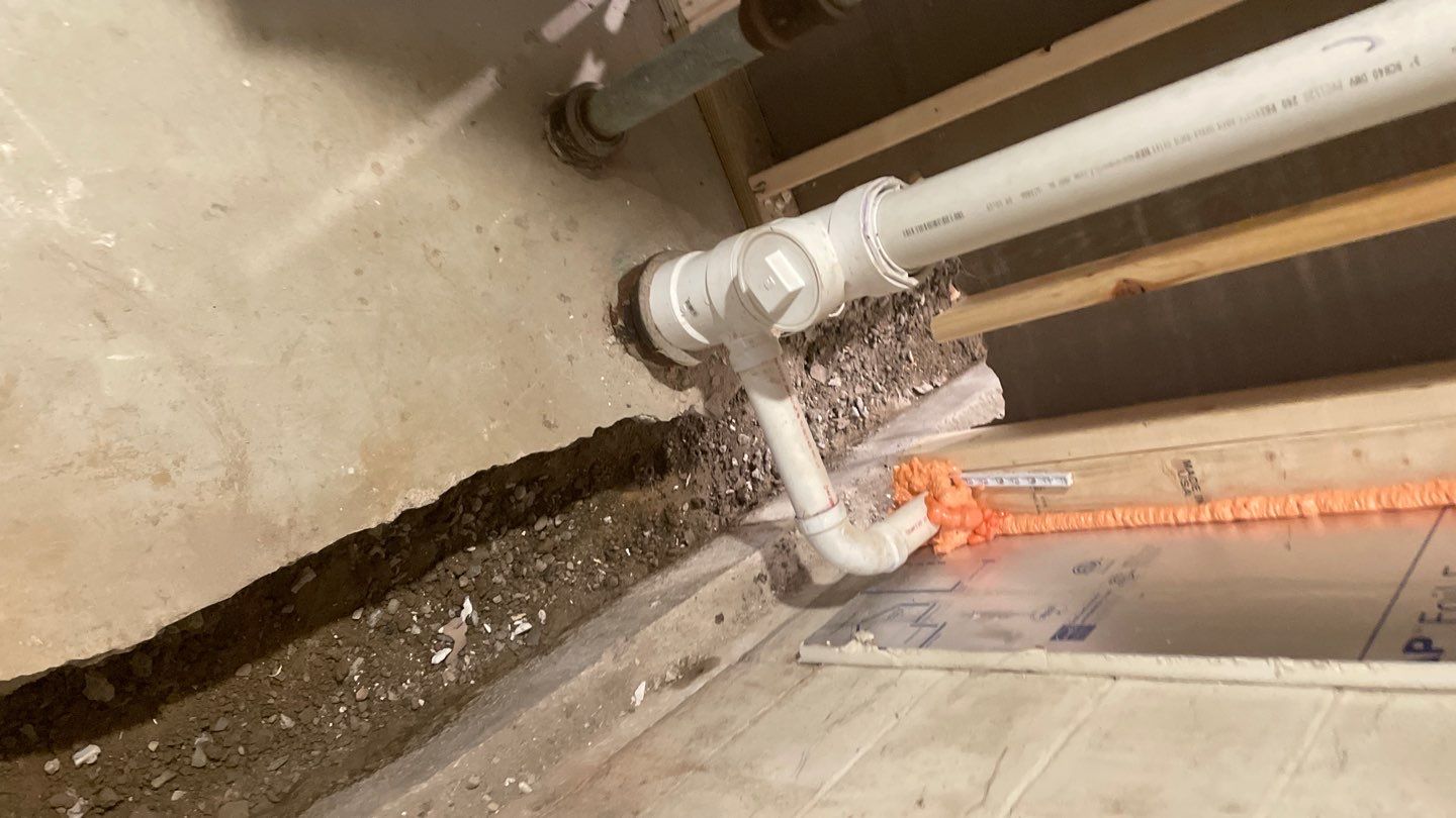 Interior Drain Tile & Buried Discharge in St. Anthony, MN by Waterproofing Northeast