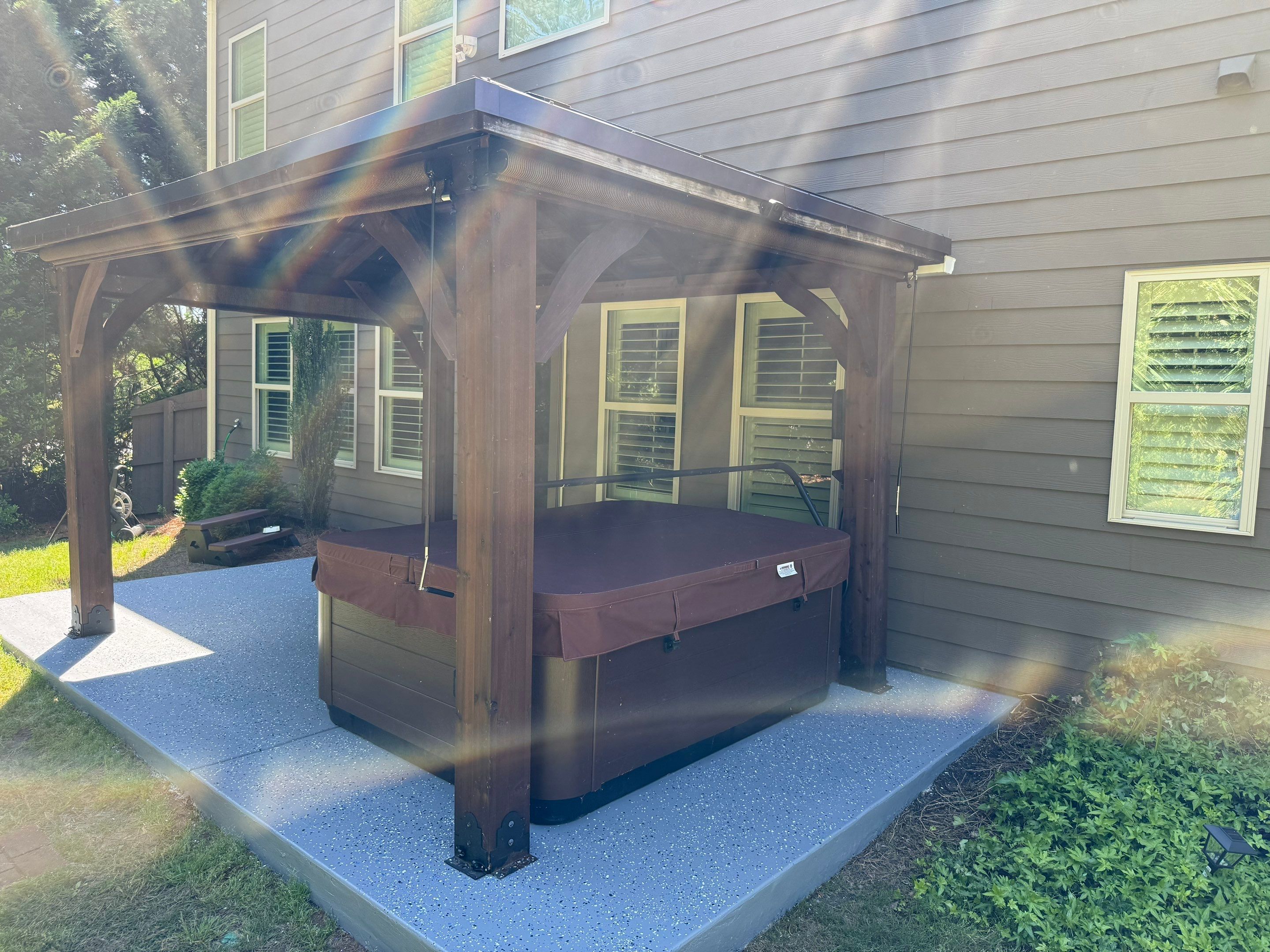 Backyard Pavilion Installation and Garage Door Upgrades in Powder Springs by Swift Home Renovations