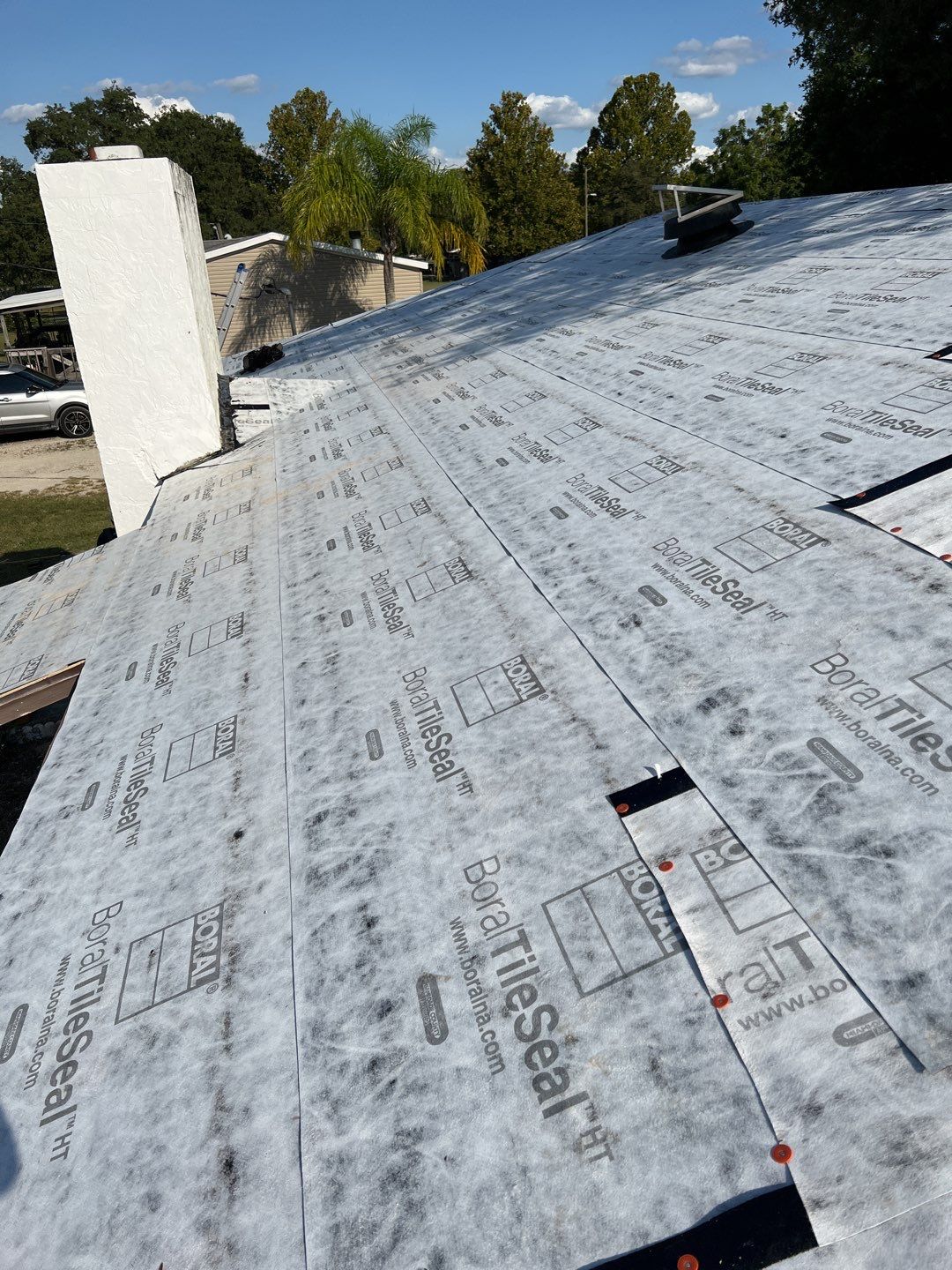 Residential Roofing Installation using 26 GA Rib Panel Galvalume by 1st Class Roofing, Inc.