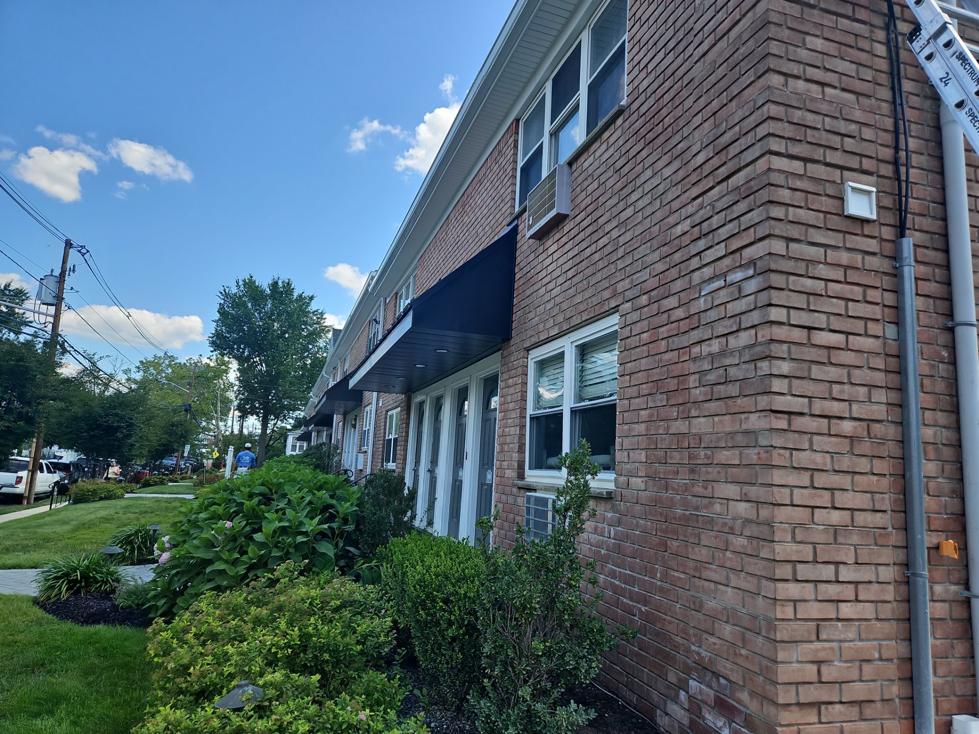 Multi-Unit Apartment Complex Exterior Brick Painting Project in Hackensack by Spectrum Painting, LLC