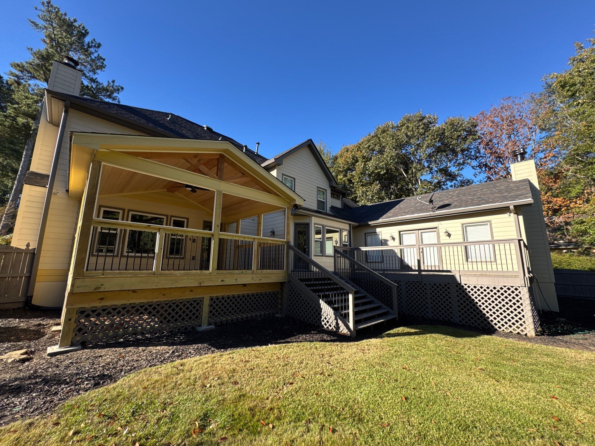 Custom Multi-Level Composite Deck and Screened-In Porch in Marietta by Swift Home Renovations