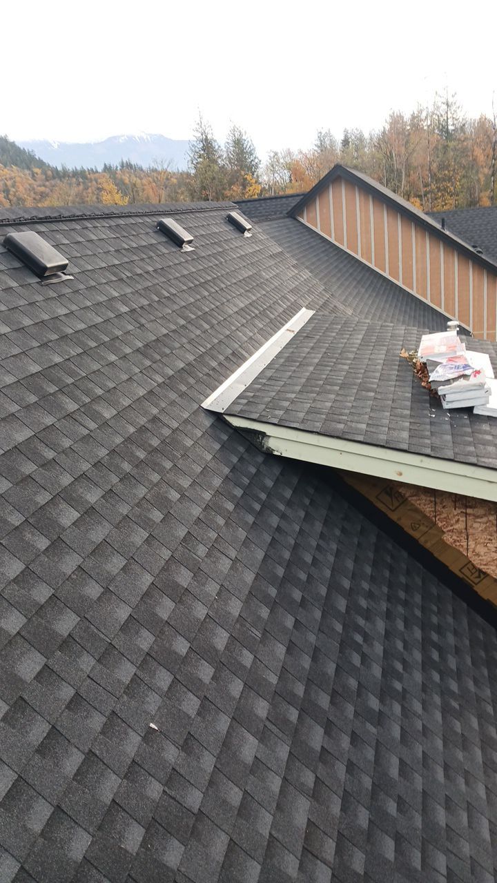 Residential Roofing Installation using GAF Charcoal HDZ by Top Notch Roofing Inc