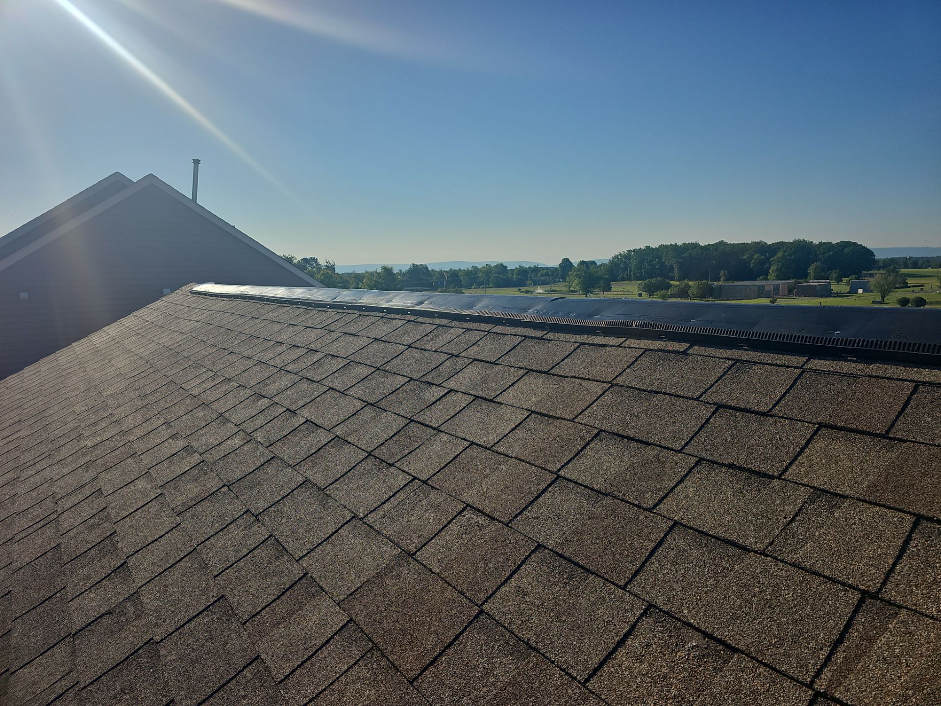 Roof Repair - Ridge Vent and Vent Flashing Boot Replacement by Winchester Roofing