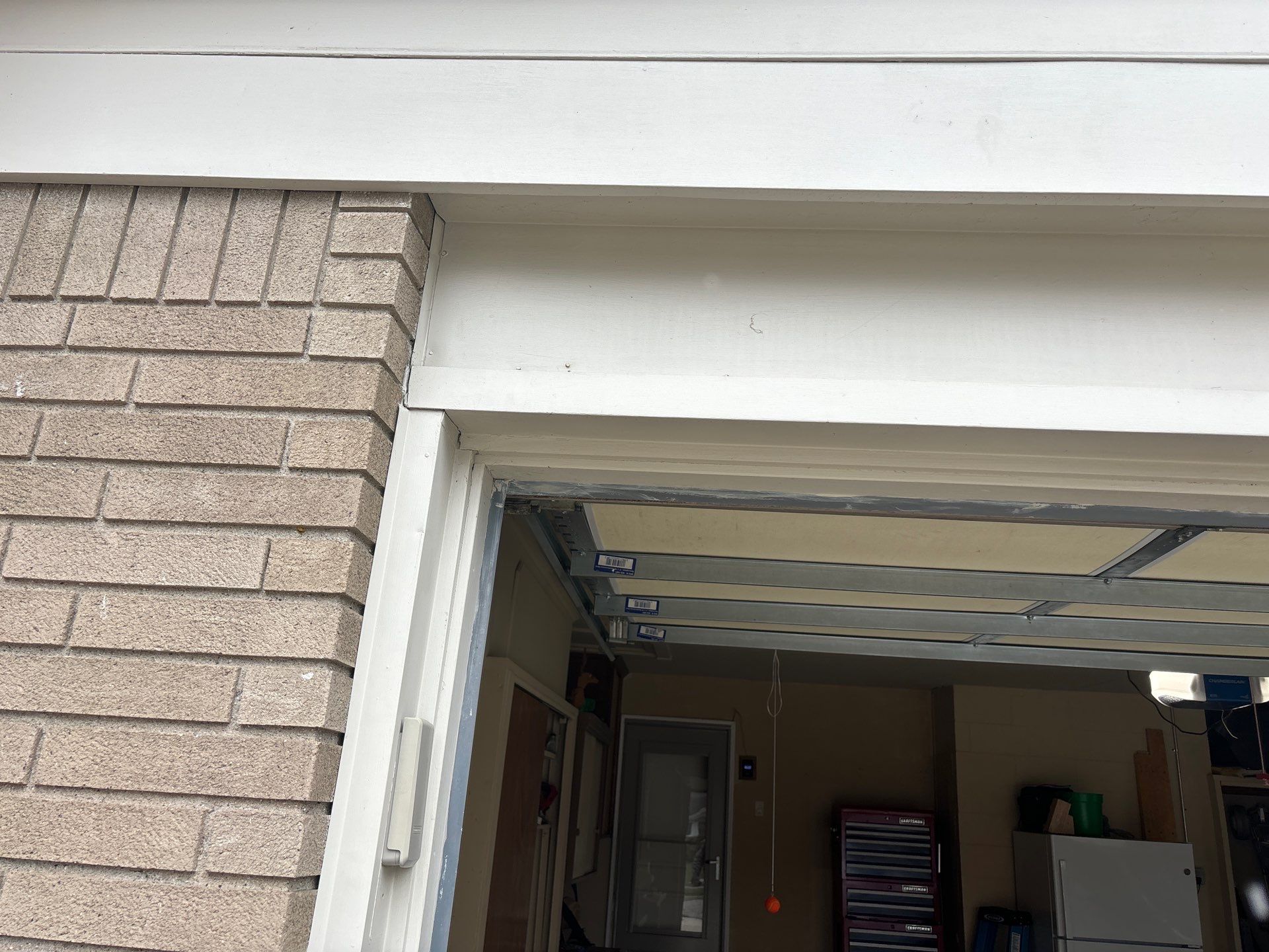 Installing new Roof, Fascia, Soffit, and Gutters. New custom trim around garage door. by Acme Exteriors