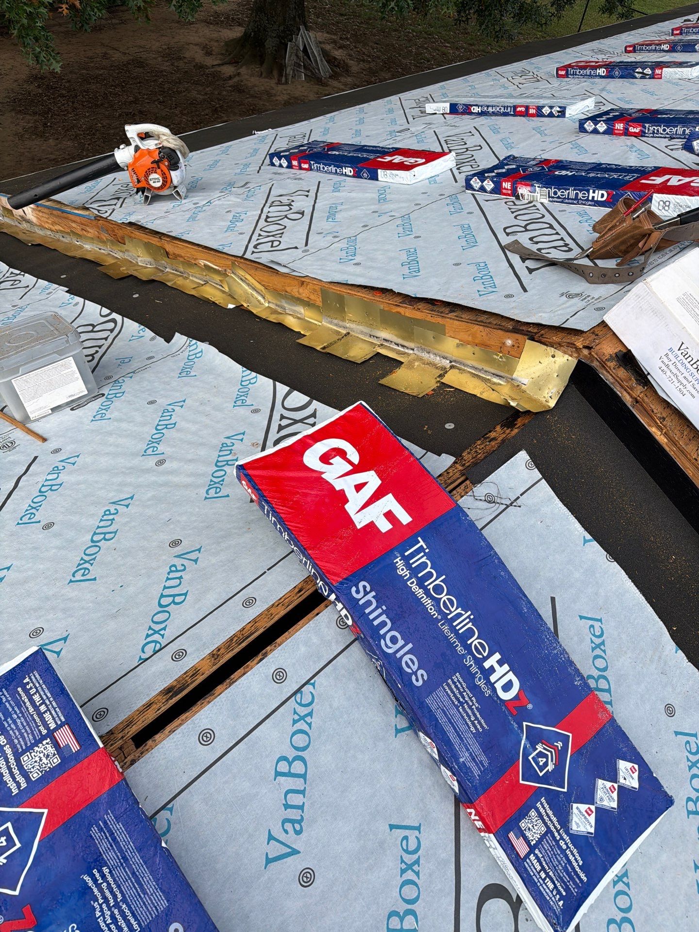 Residential Roofing Installation using GAF Timberline HDZ Charcoal by Rainstoppers Roofing