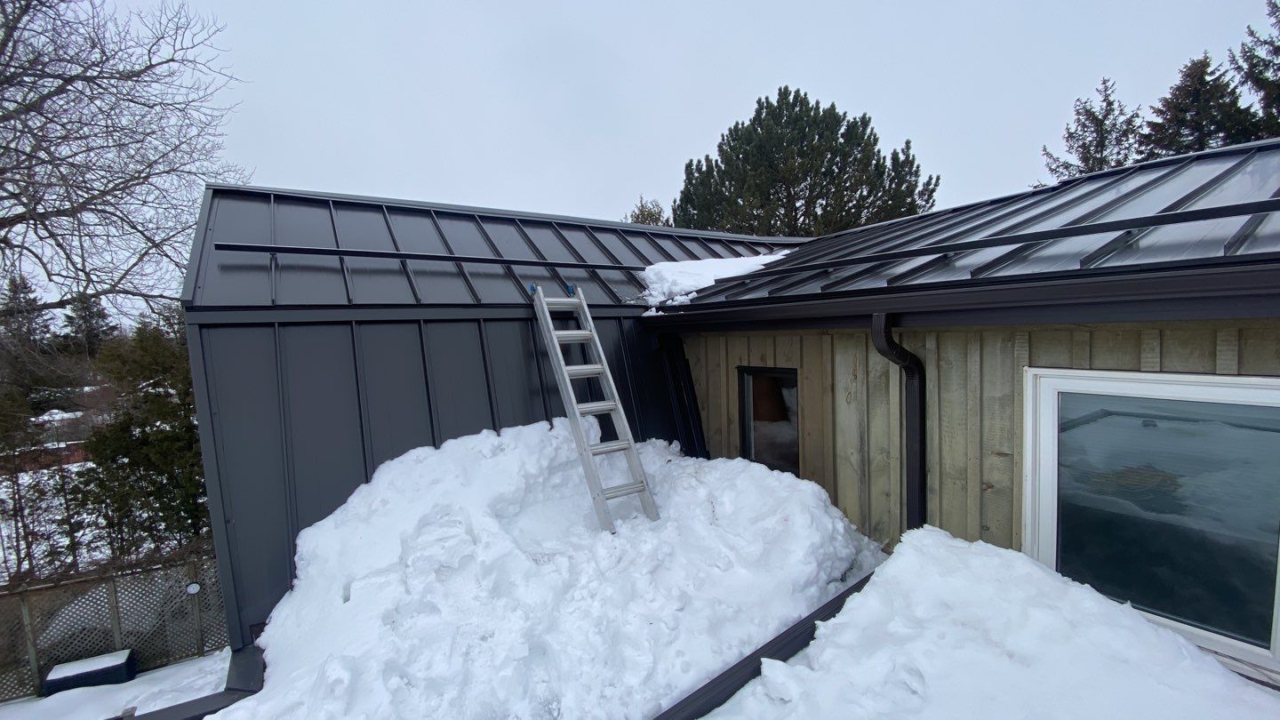 Residential Roofing Installation using 16" Standing Seam Panels by Jay Carter Roofing & Sheet Metal
