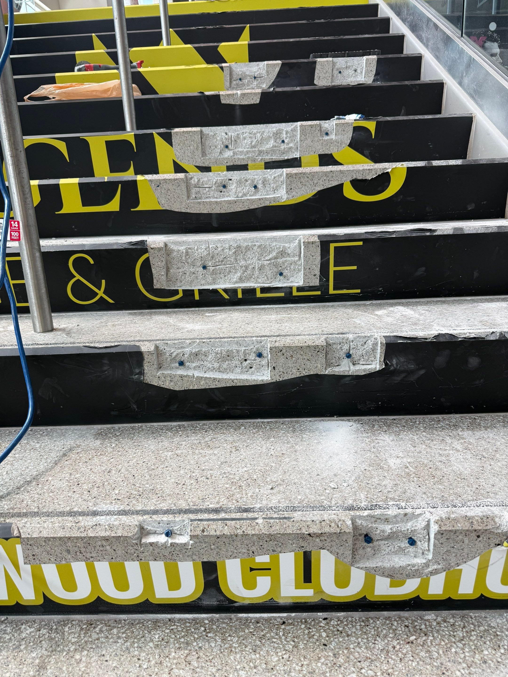 Concrete Stair Tread Restoration and Safety Upgrade in Sioux Falls by Select Painting, Coatings & Garage Cabinets