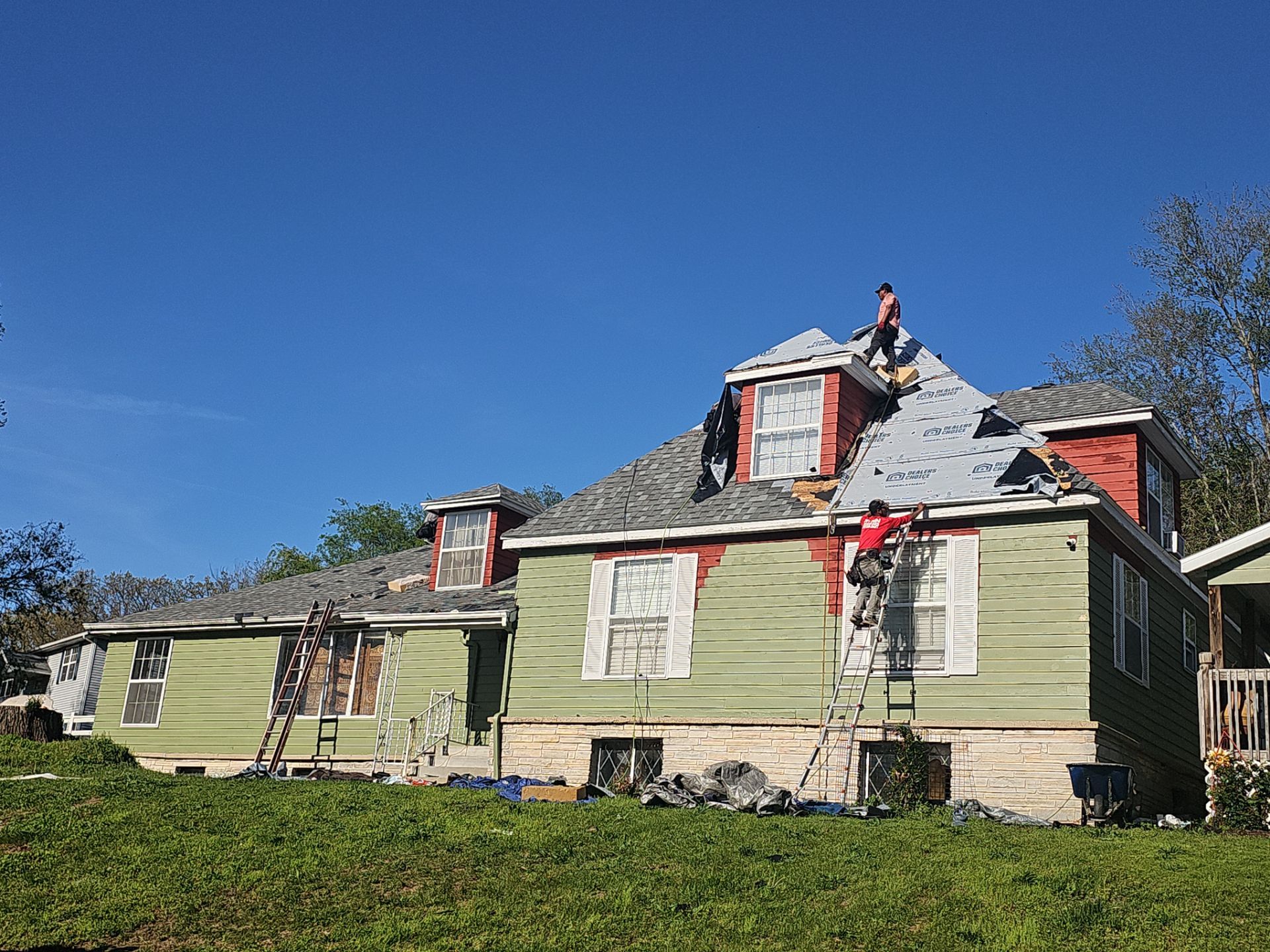 Residential Roof + Gutters & Downspouts Install  by Titan Commercial & Residential Roofing 