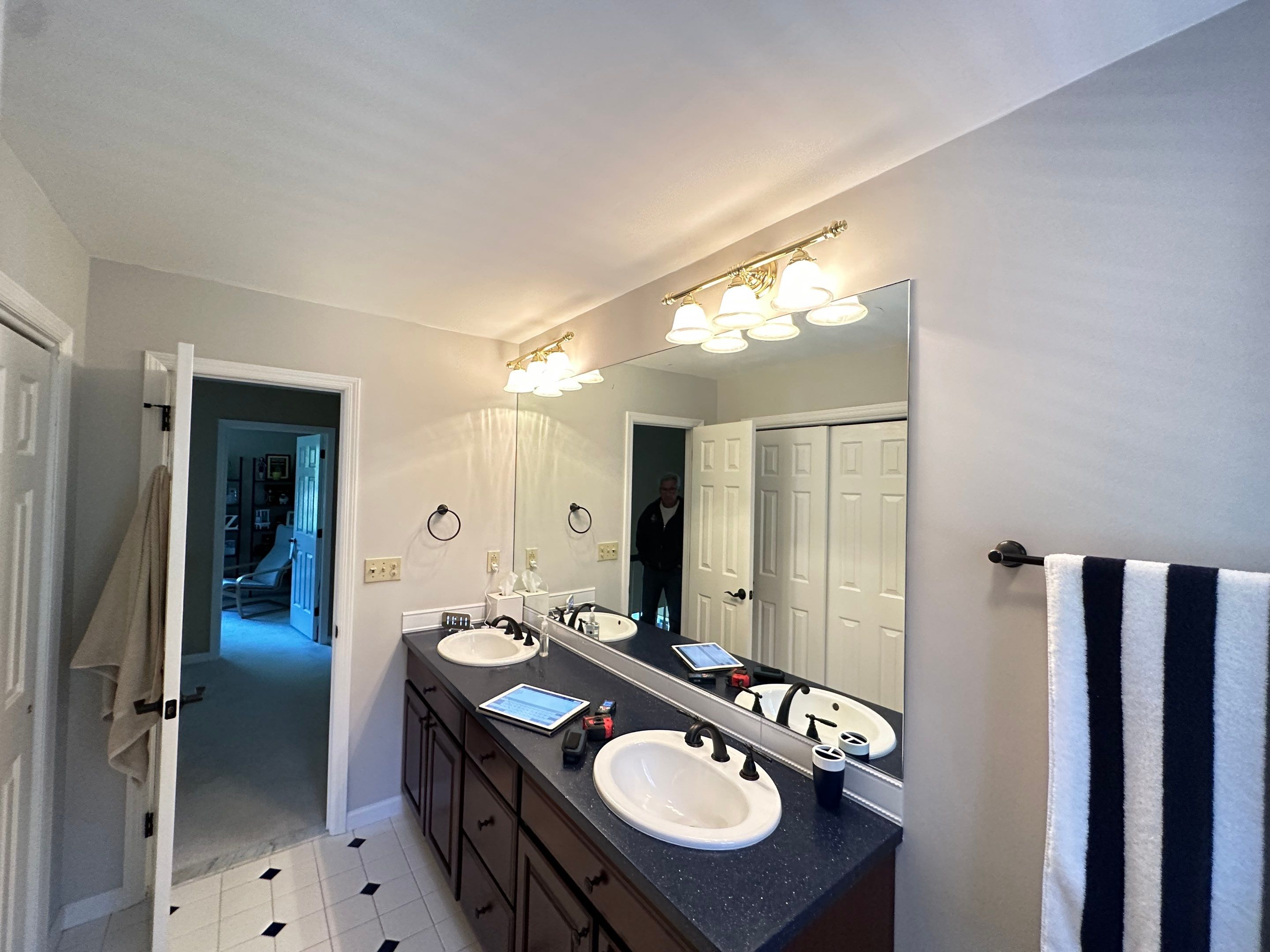 Bathroom Remodel using LVP Flooring by Home Concepts Construction