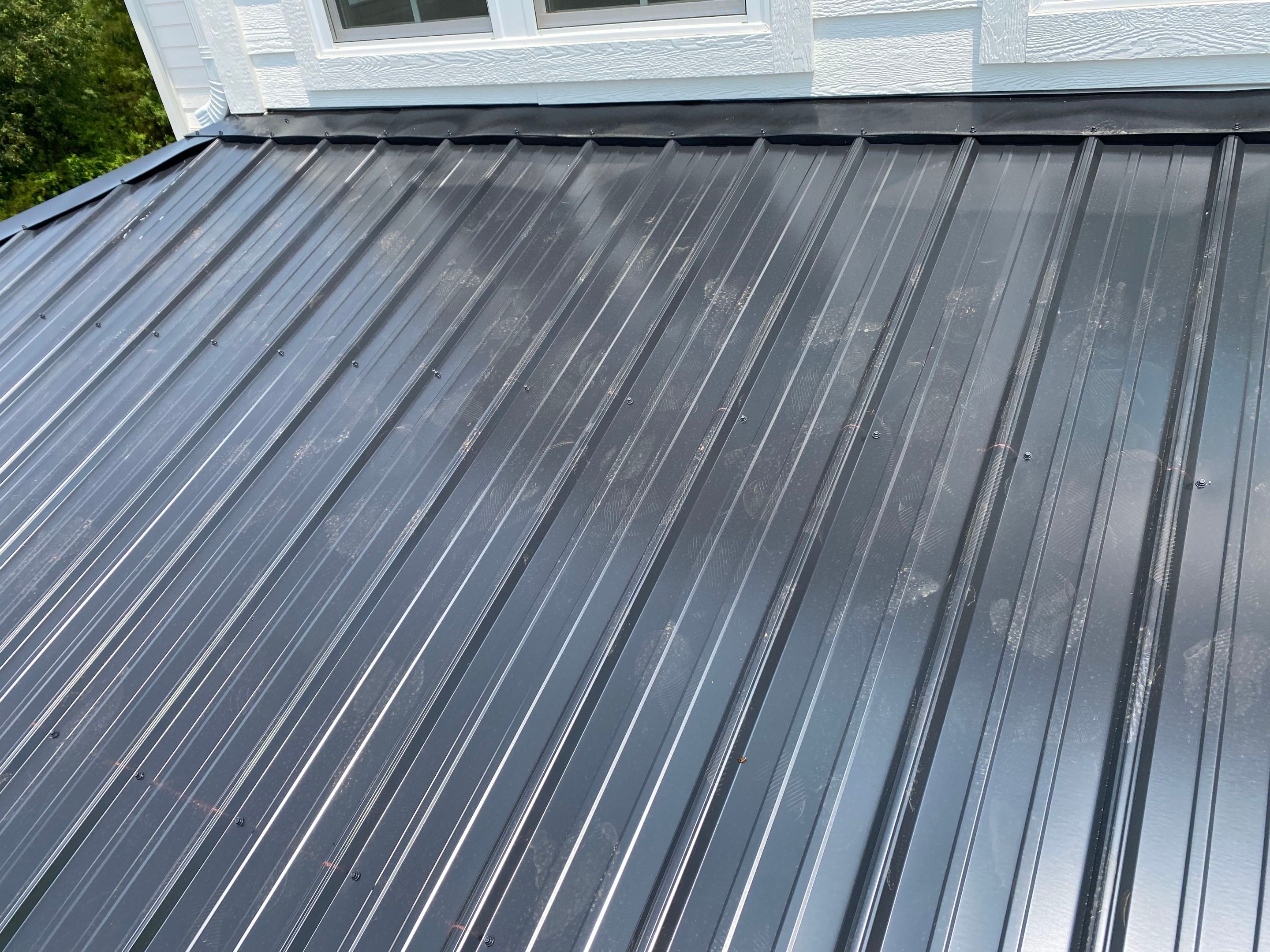 Jason's metal porch roof by BROCK BUILDERS 