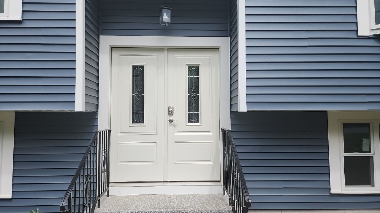 Siding and windows replaced by UBrothers Construction