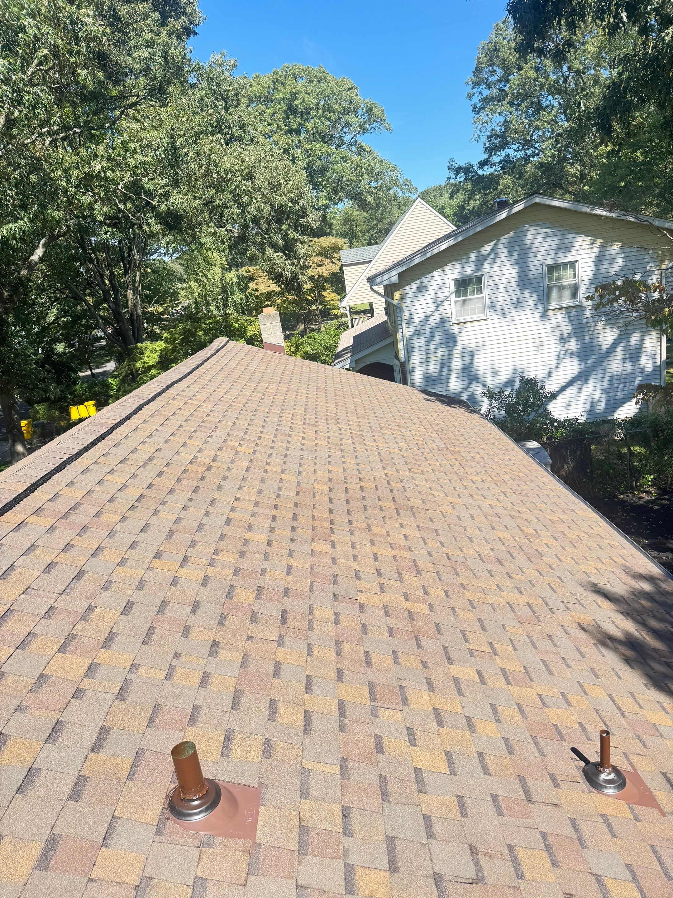 Full Roof Replacement and Gutter Guard Installation in Pasadena, Maryland by First Chesapeake Roofing