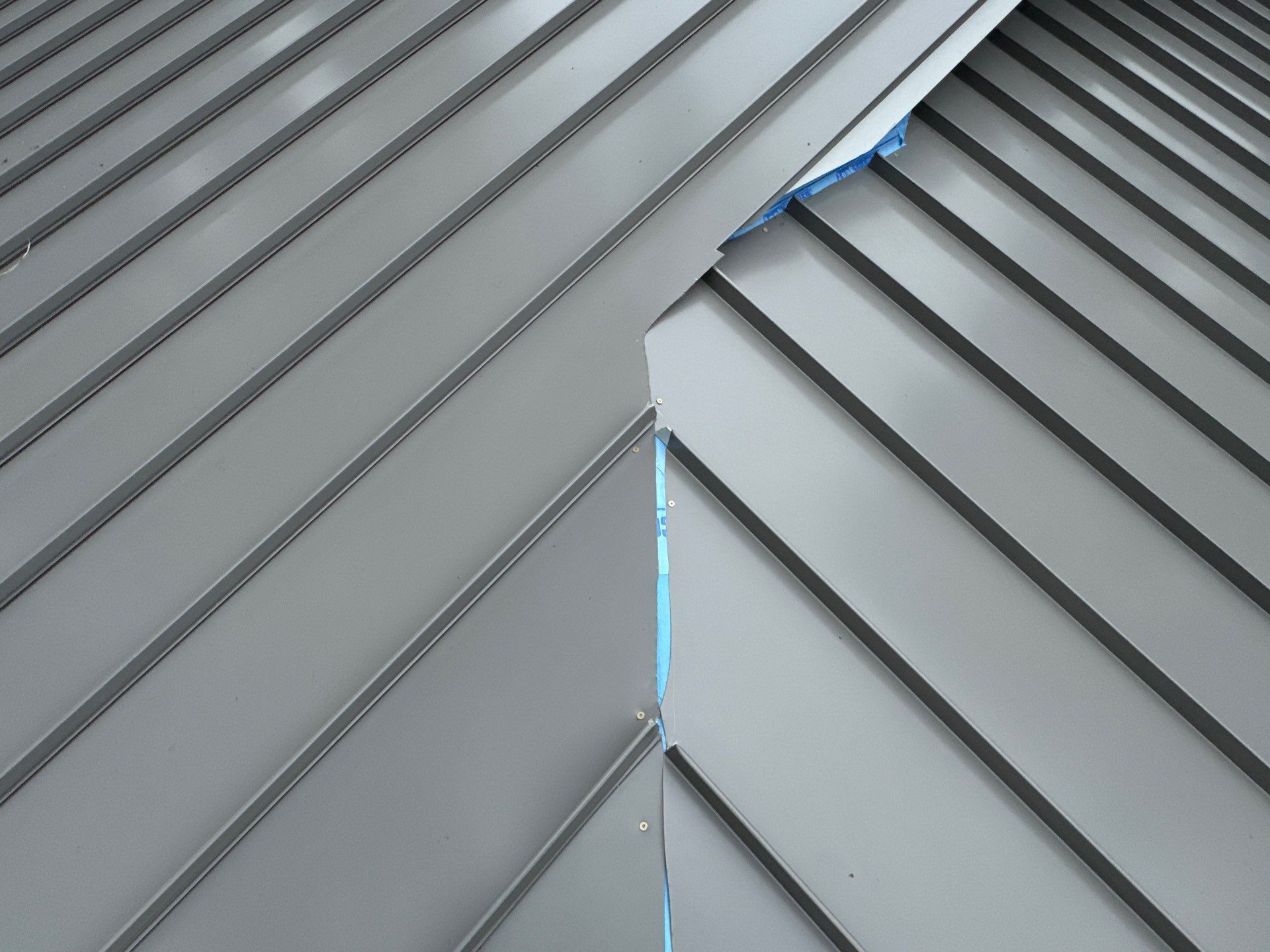 Custom New Construction Metal Roof Installation in Deltaville by Cade Construction