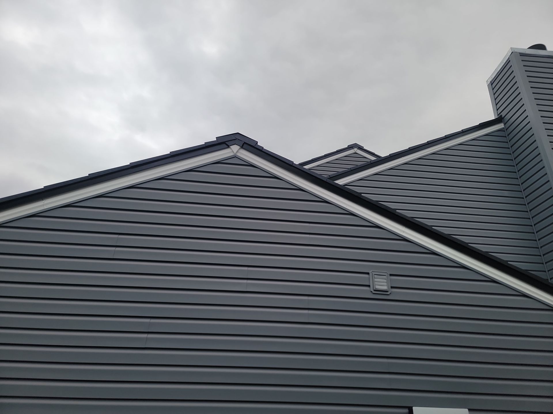 Tesla Solar Roof + Powerwall in Virginia Beach, VA by American Home Contractors