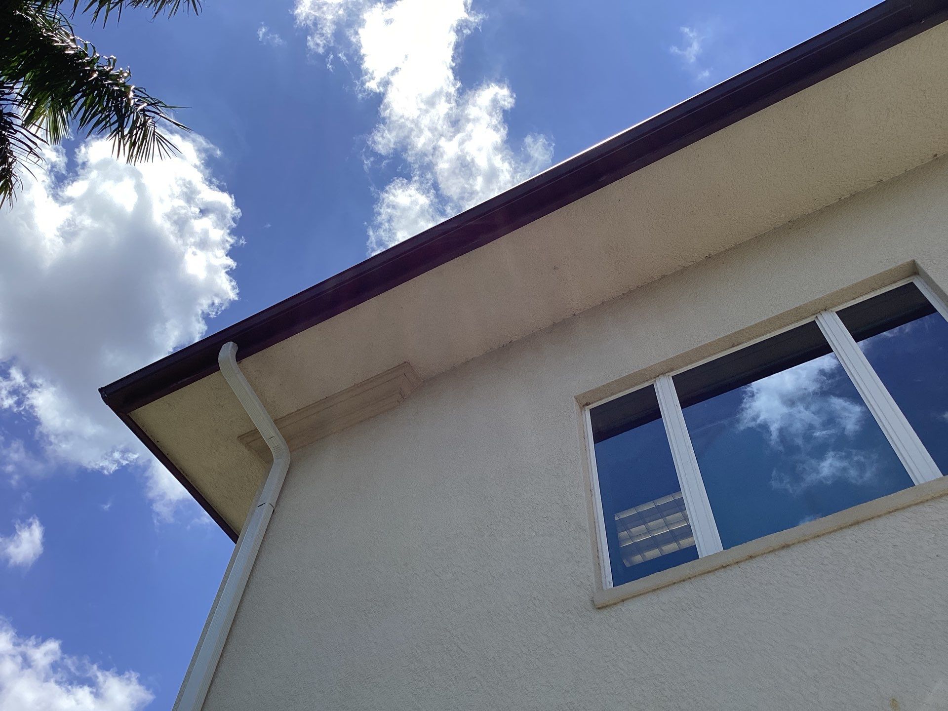 Musket Brown Seamless Gutters using Musket Brown Seamless Gutters in Capen Coral FL by Gutter Professors